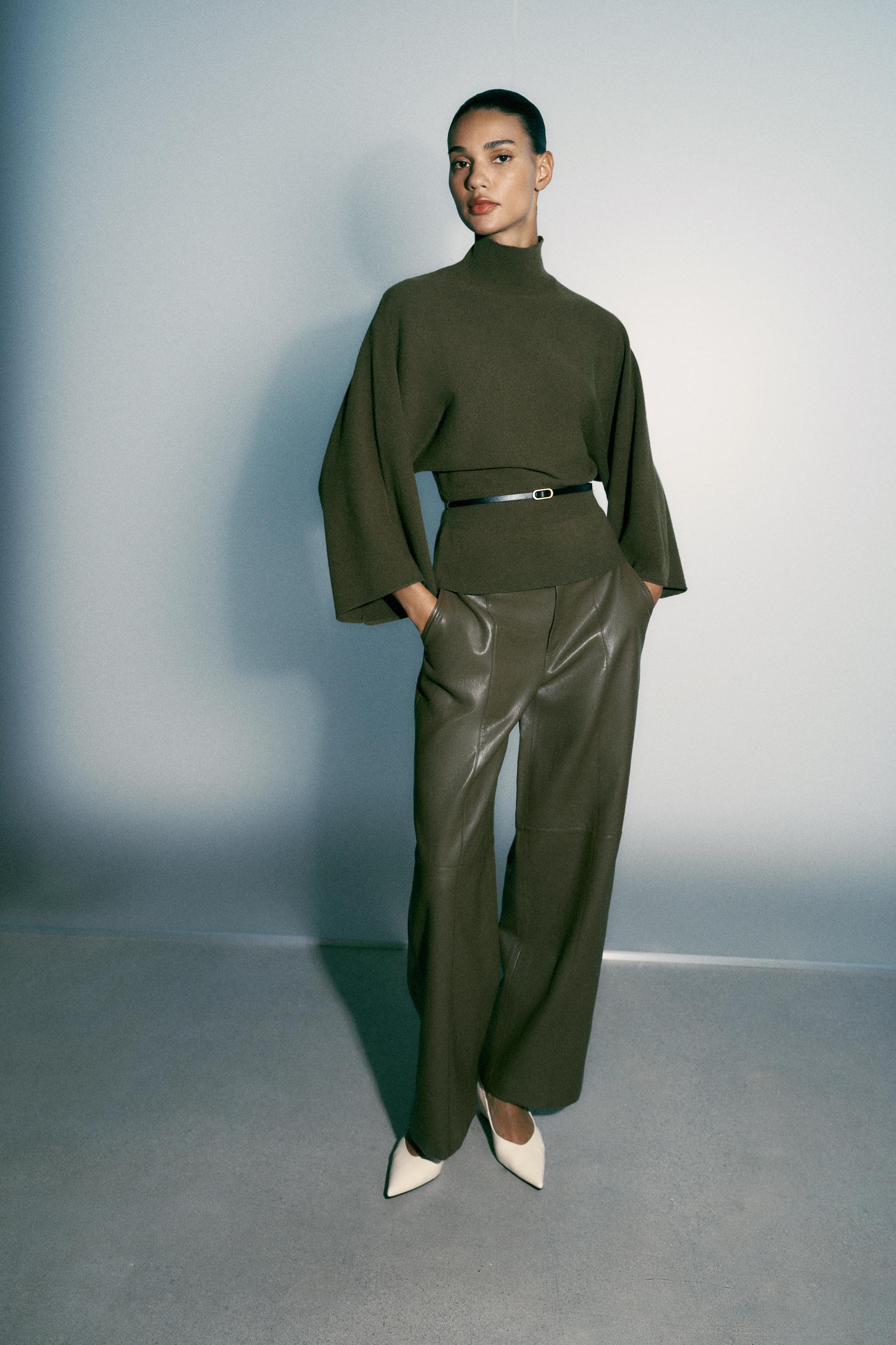 BELTED KNIT SWEATER