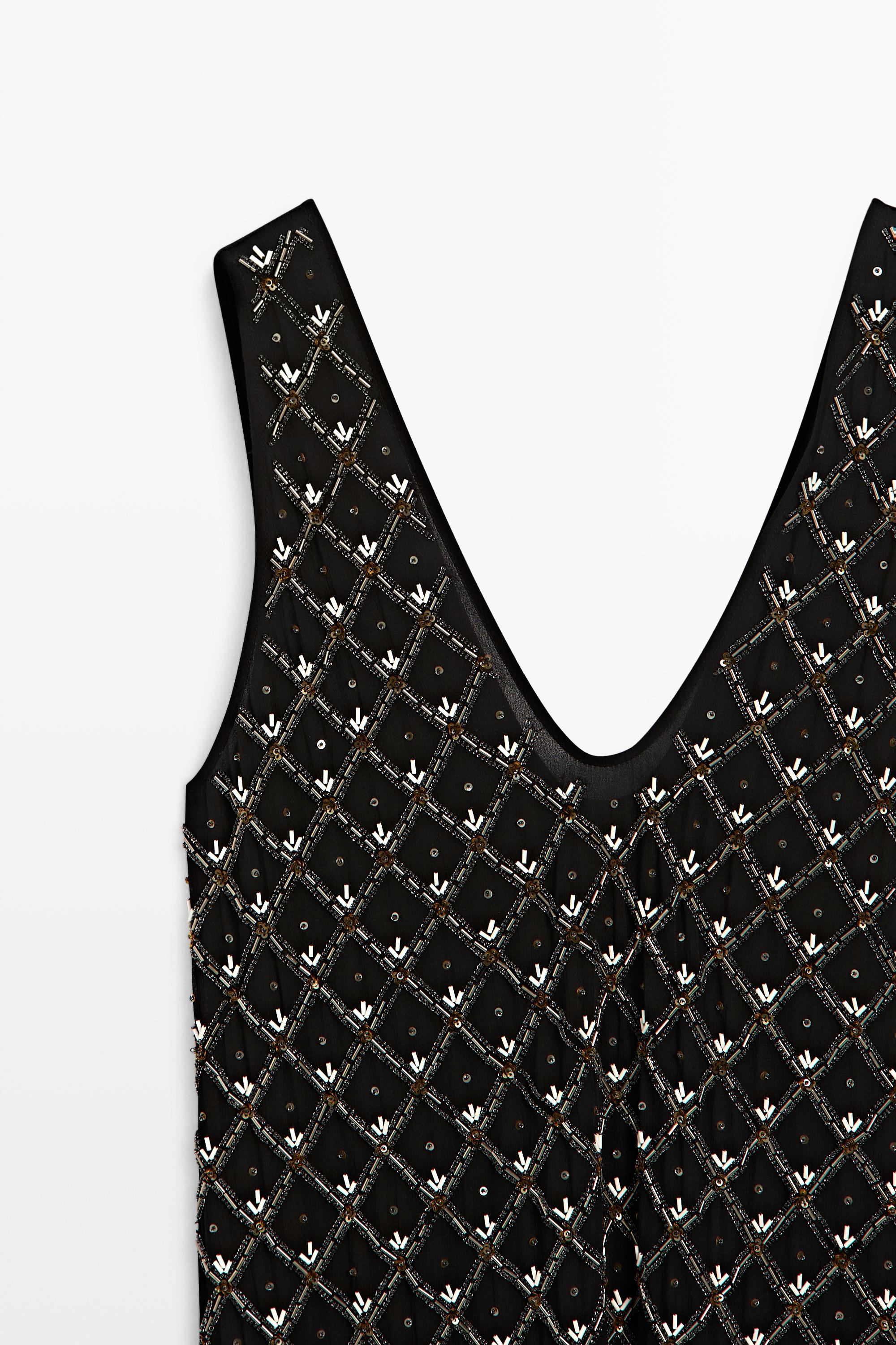 Mini dress with beaded detail