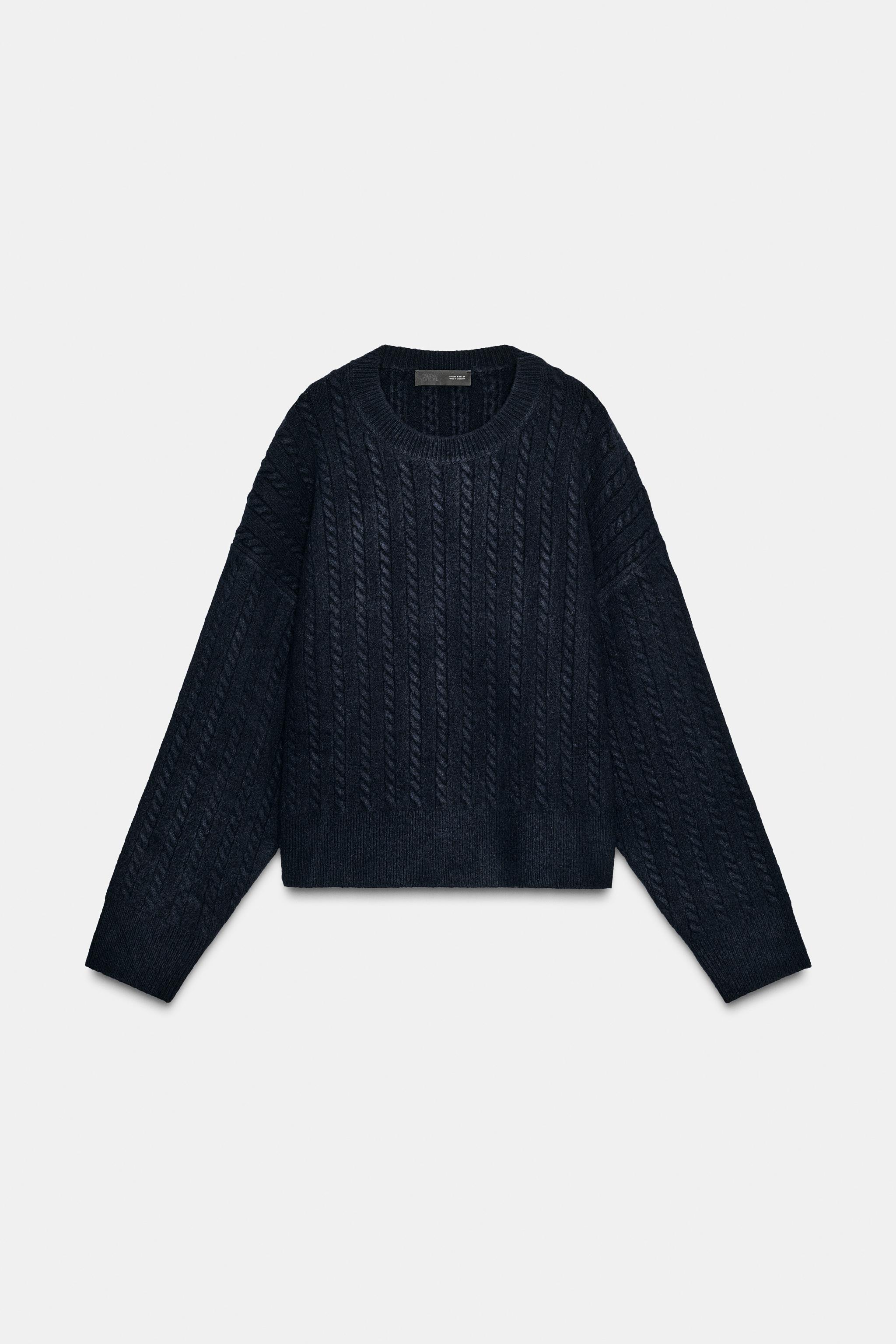 PULL EN MAILLE À TORSADES
