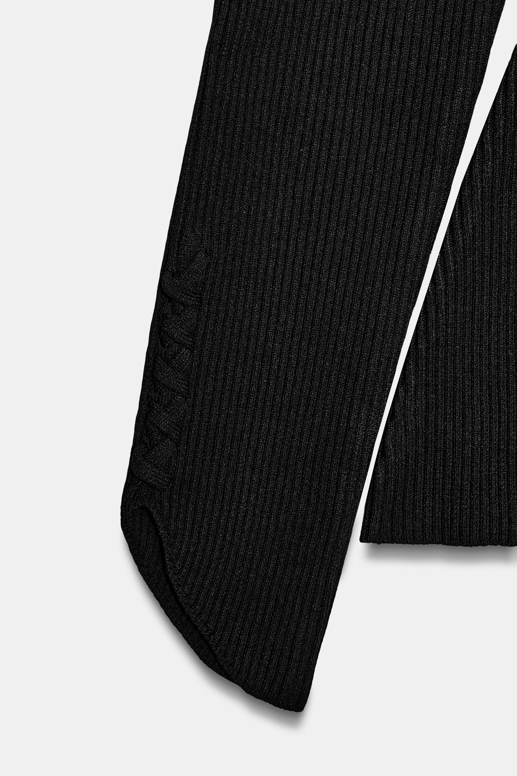 VESTE EN MAILLE À MANCHES BOUFFANTES