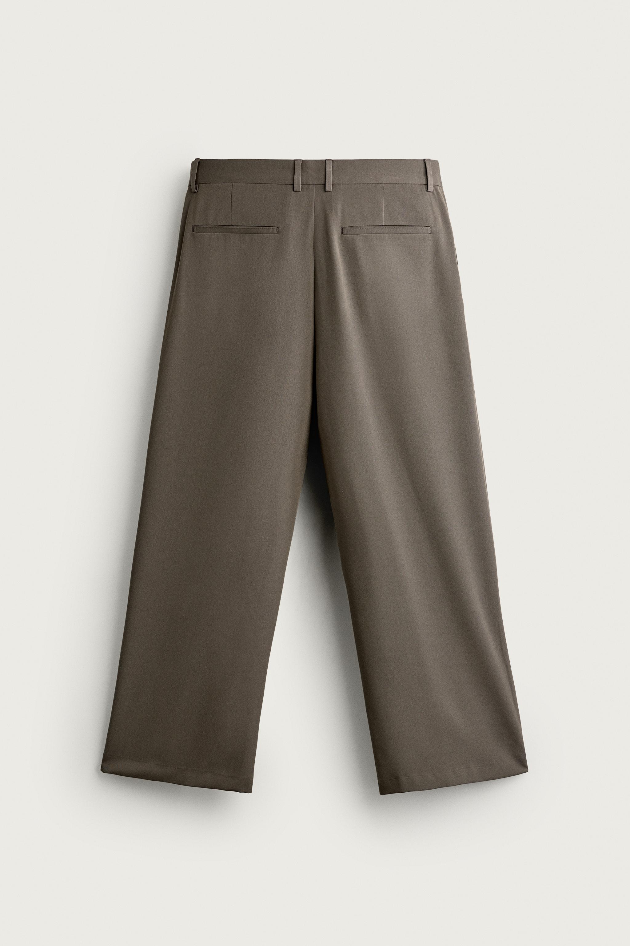 PLEATED WIDE-FIT PANTS