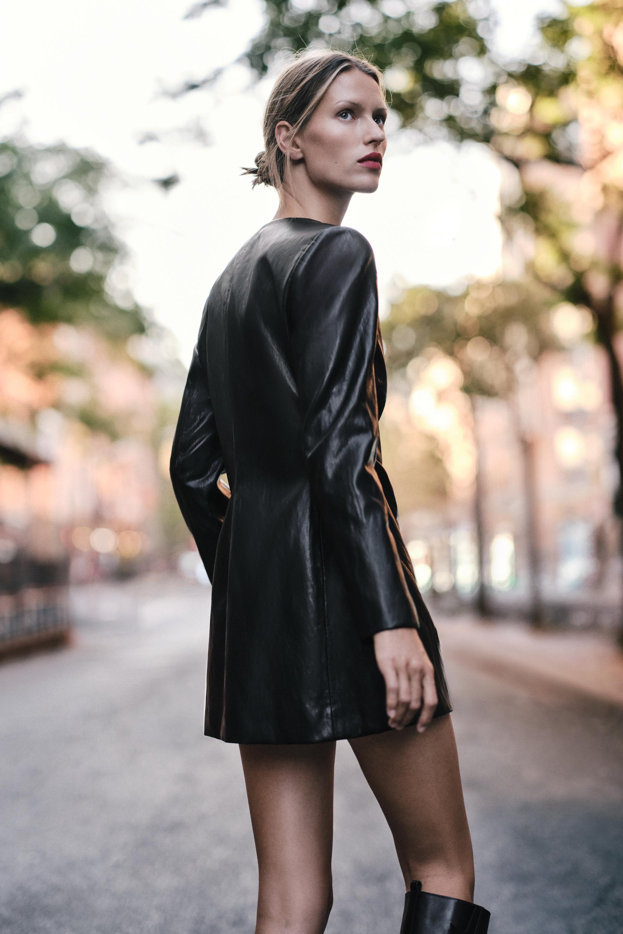 FAUX-LEATHER EFFECT DRESS WITH GOLD APPLIQUÉ