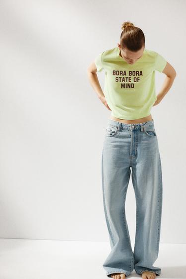 تيشرت بمظهر مغسول ونص - ليموني الخاص بـ Zara