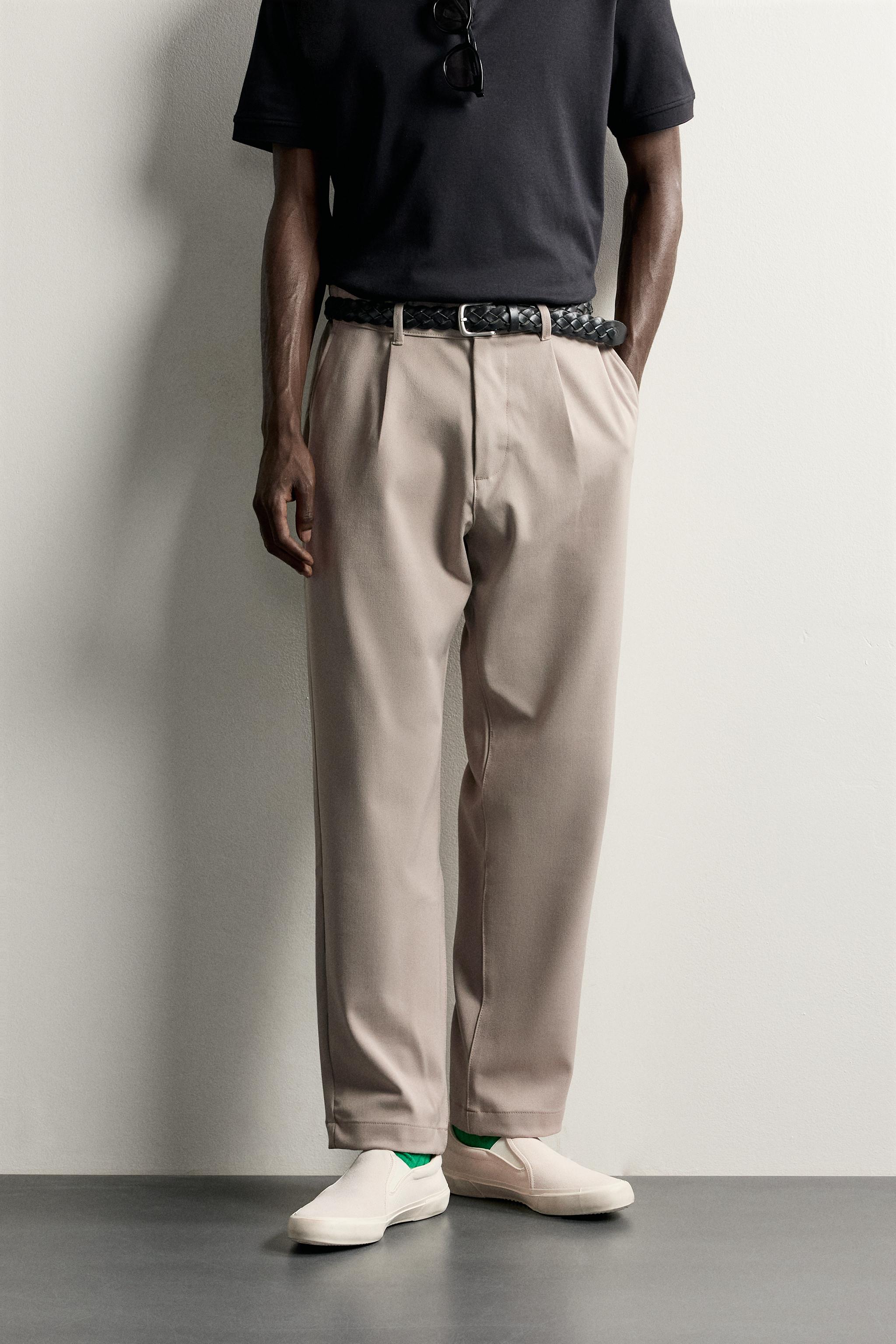RELAXED FIT PLEATED TROUSERS — Beige