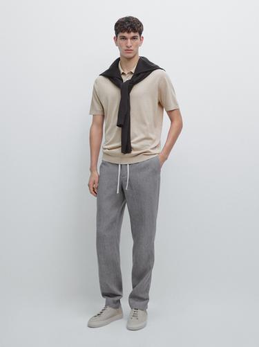 Polo punto manga corta algodón - Beige de Zara