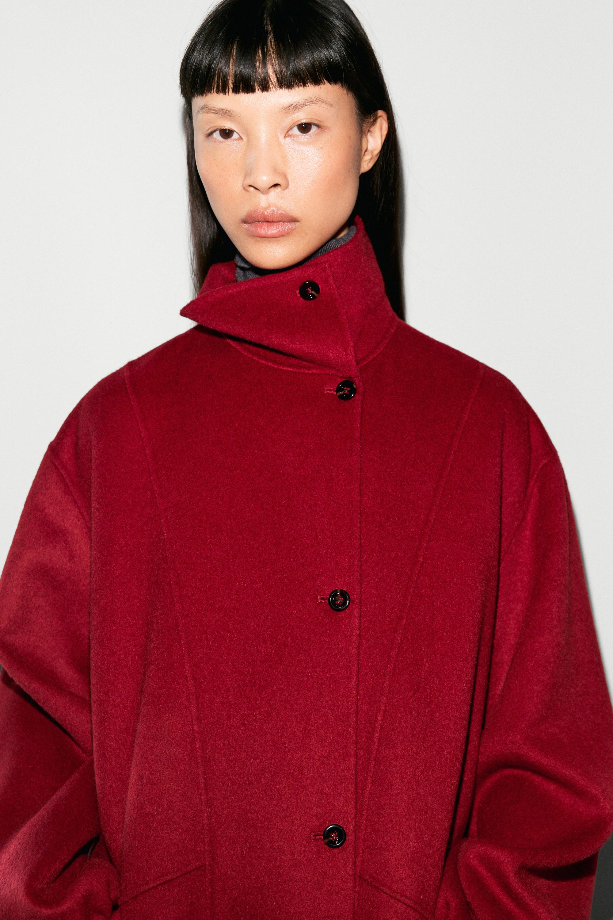 Long coat with asymmetrical collar detail