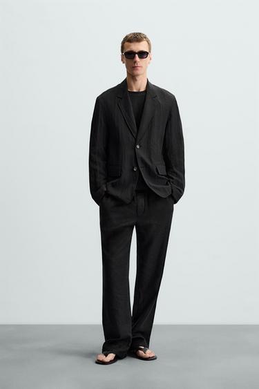 BLAZER FLUIDA EFECTO ARRUGADO - Negro de Zara - Imagen 0