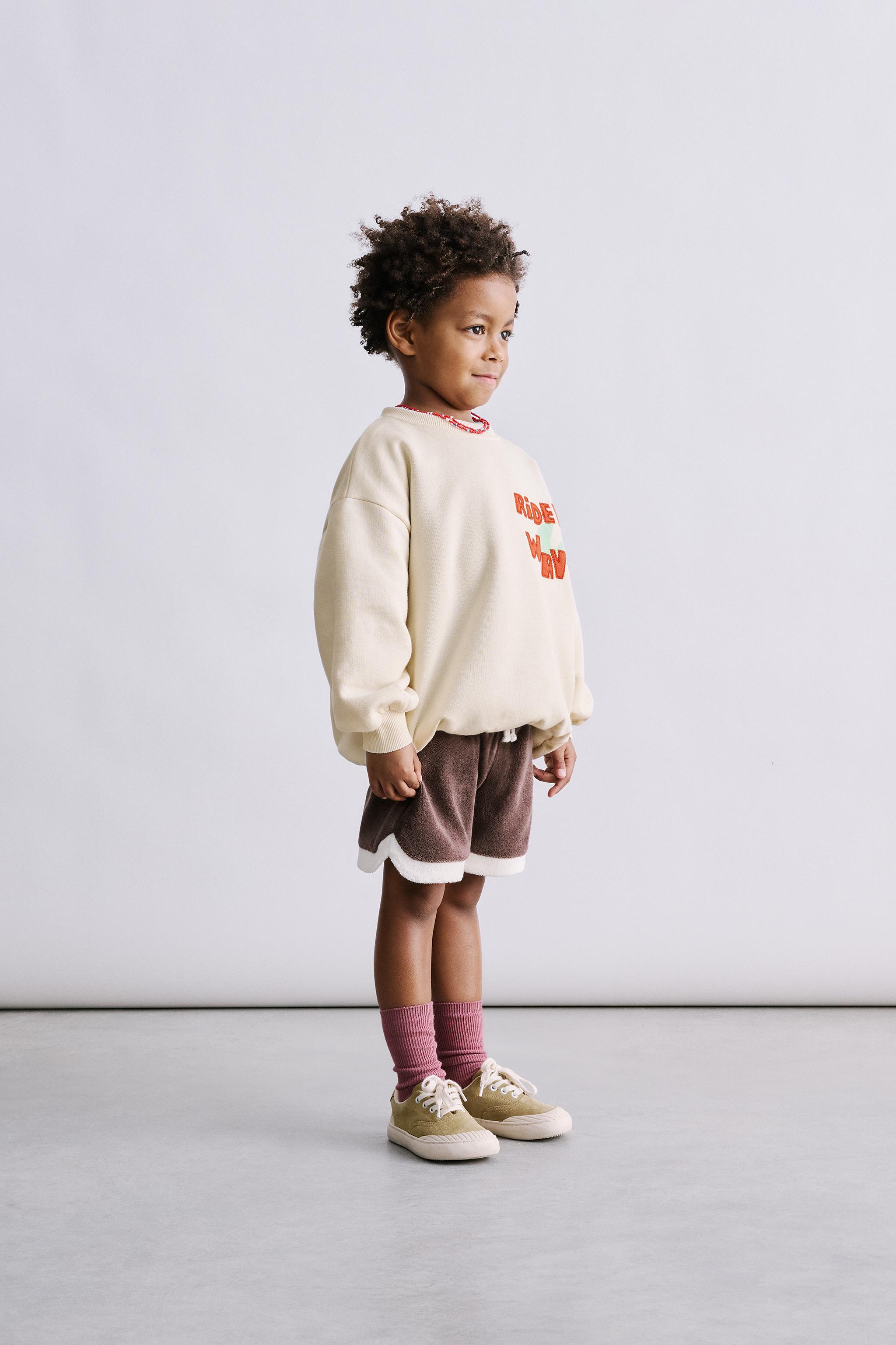 TERRYCLOTH EFFECT SHORTS WITH LABEL