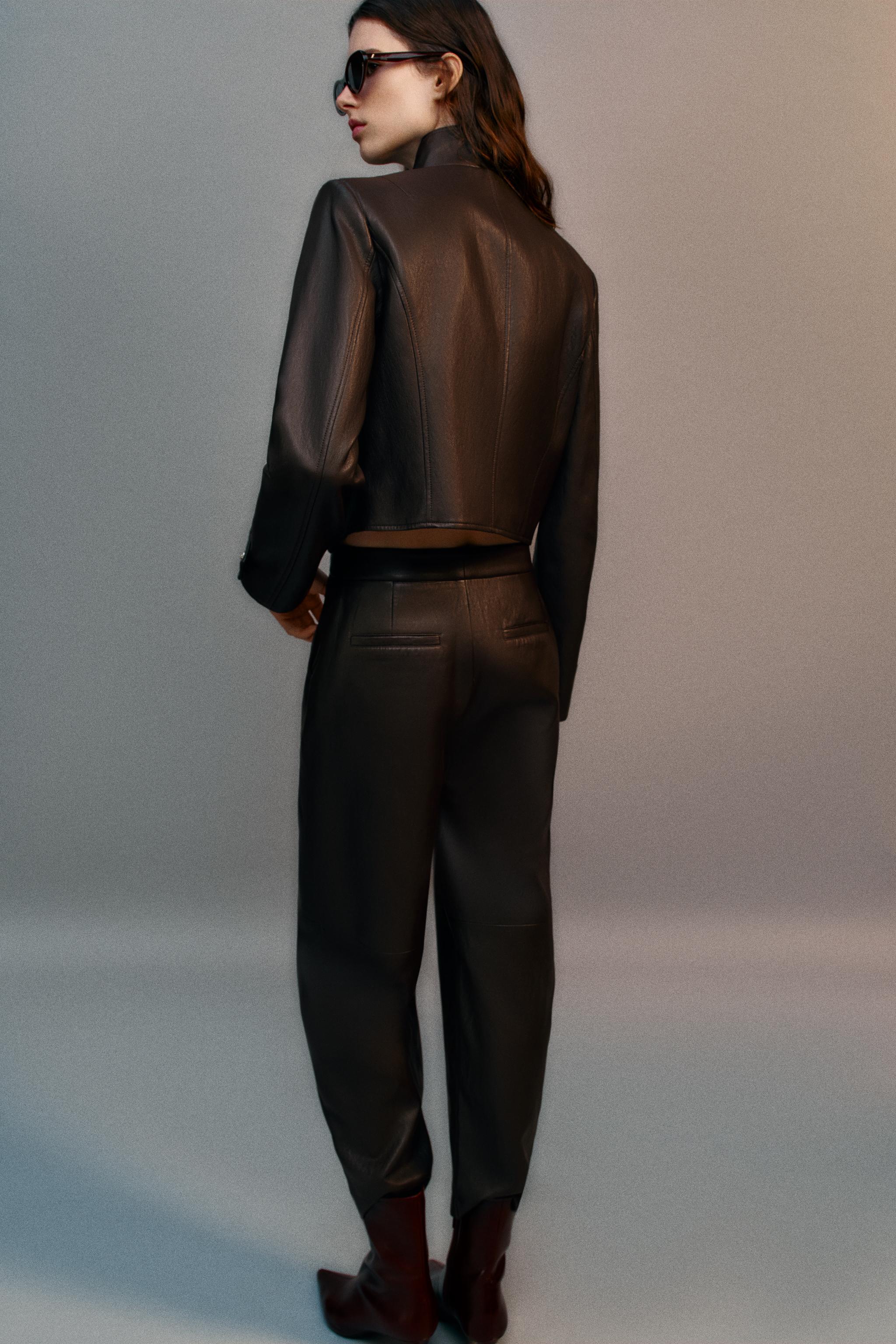 VESTE COURTE MATIÈRE SYNTHÉTIQUE