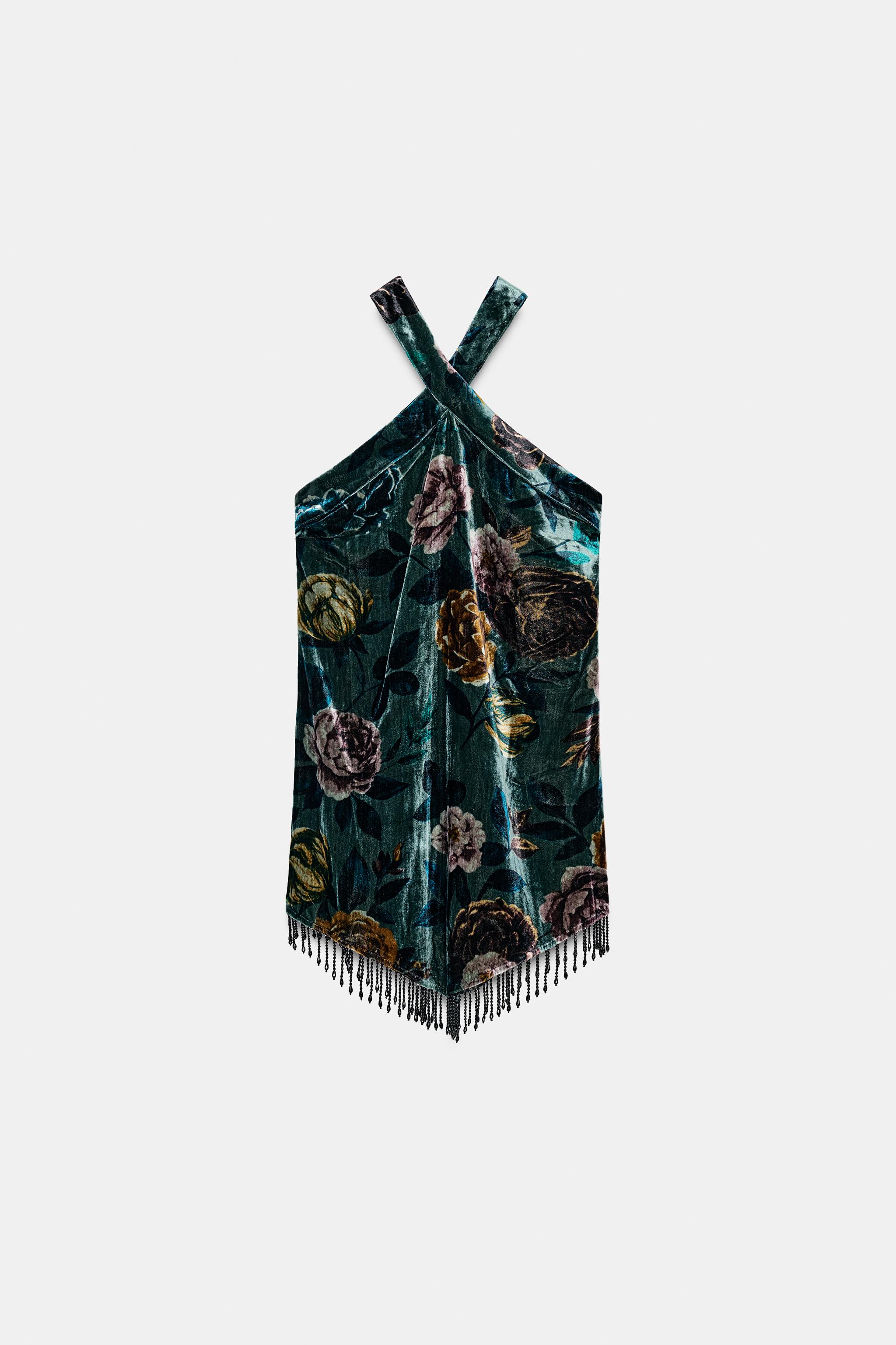 ROBE EN VELOURS ET FRANGES