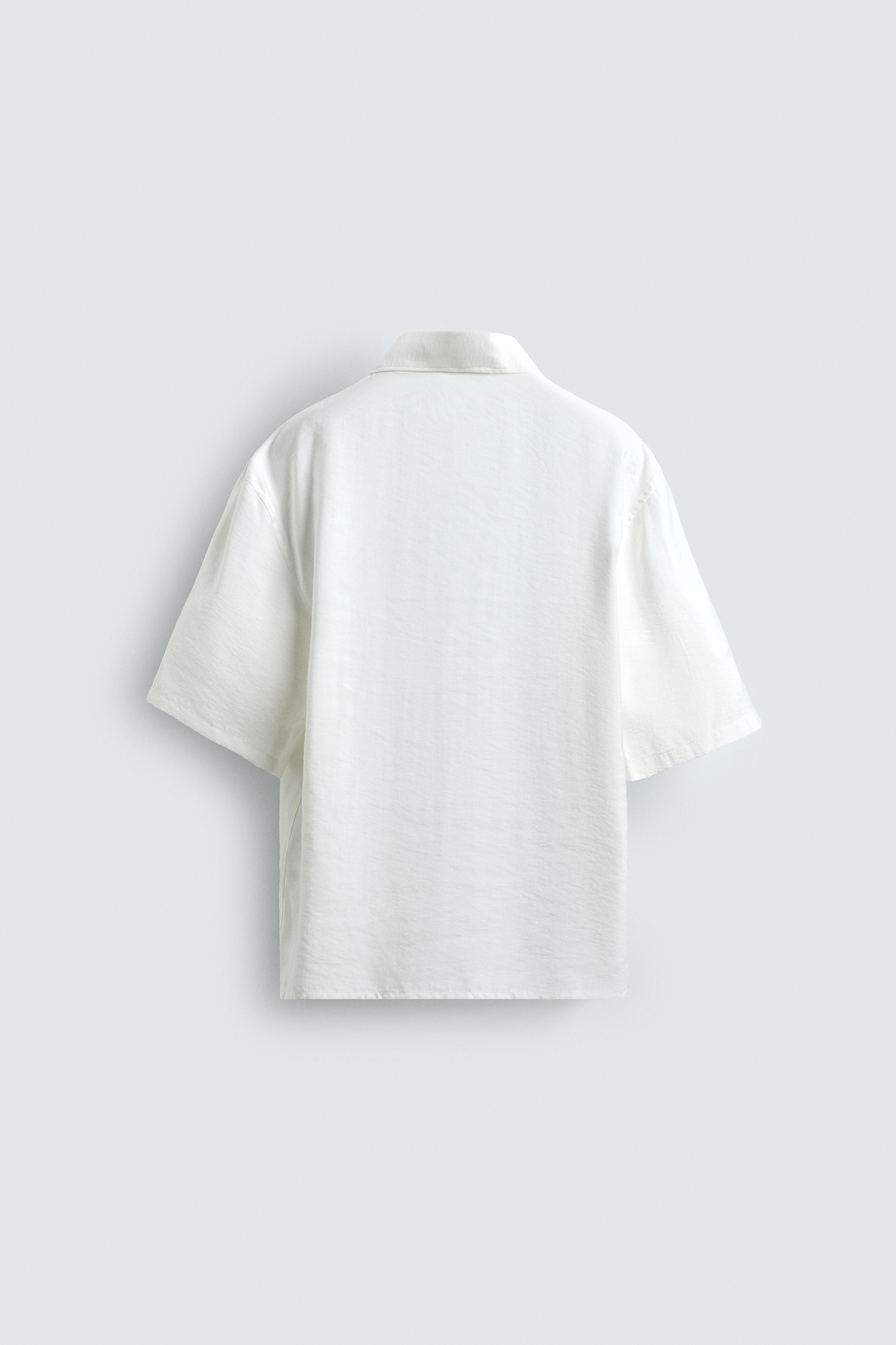 CHEMISE POLO FLUIDE À SURPIQÛRES