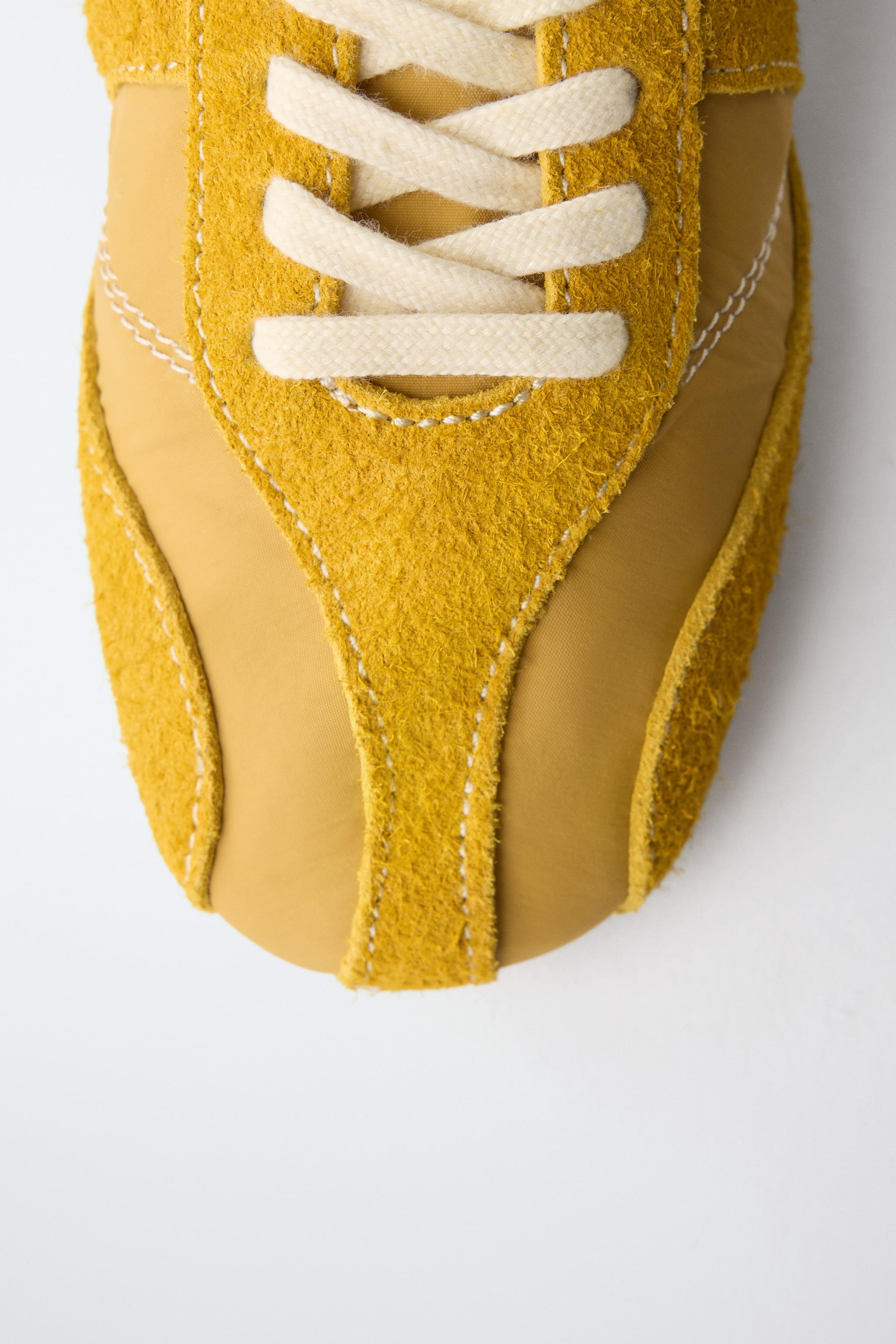 MIXED-MATERIAL LEATHER SNEAKERS
