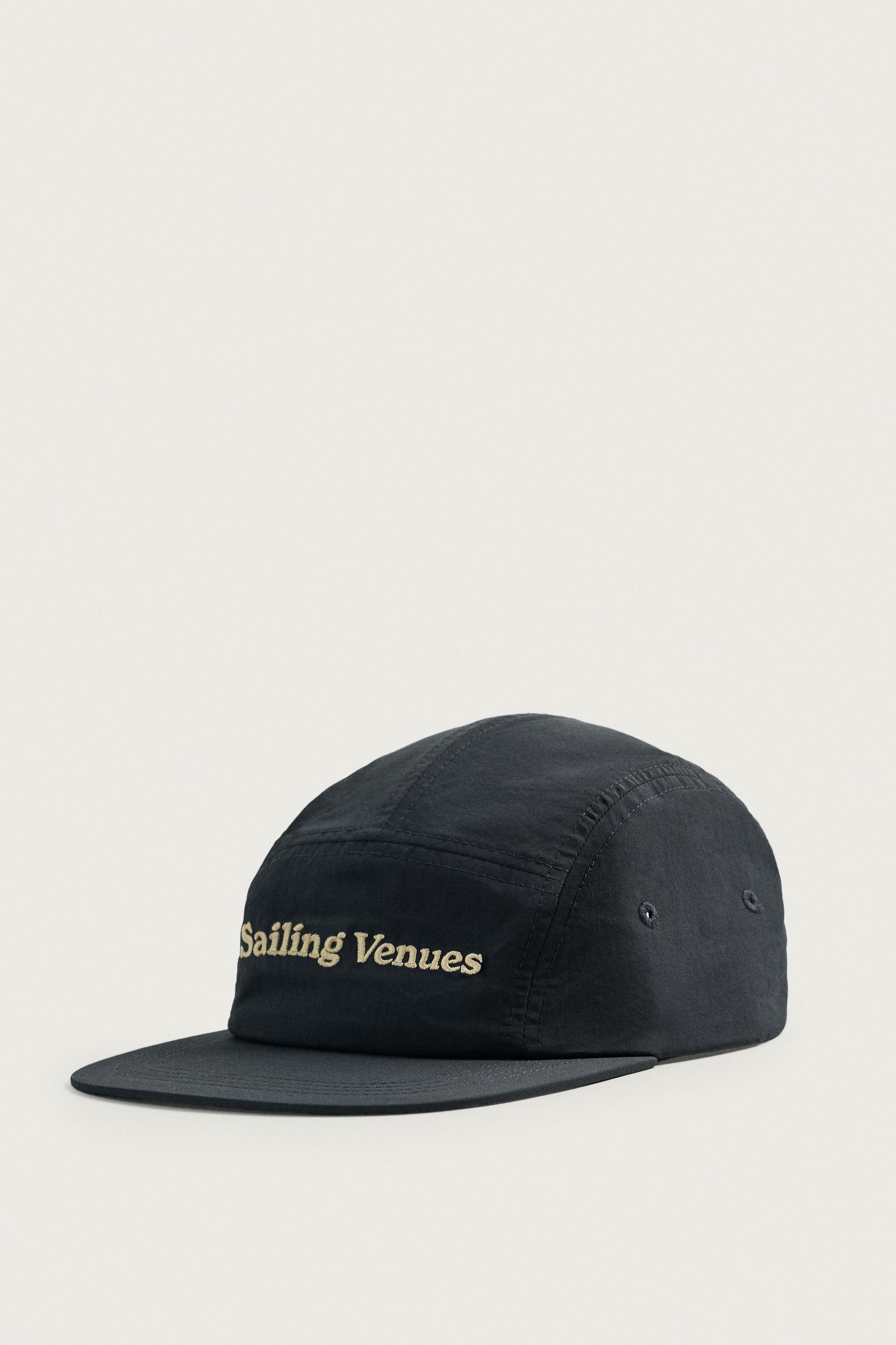 EMBROIDERED FLAT VISOR CAP — Navy blue