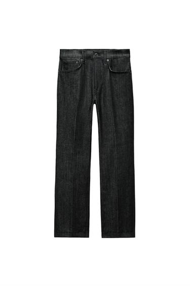 Front view of black trousers with front pockets and visible button.