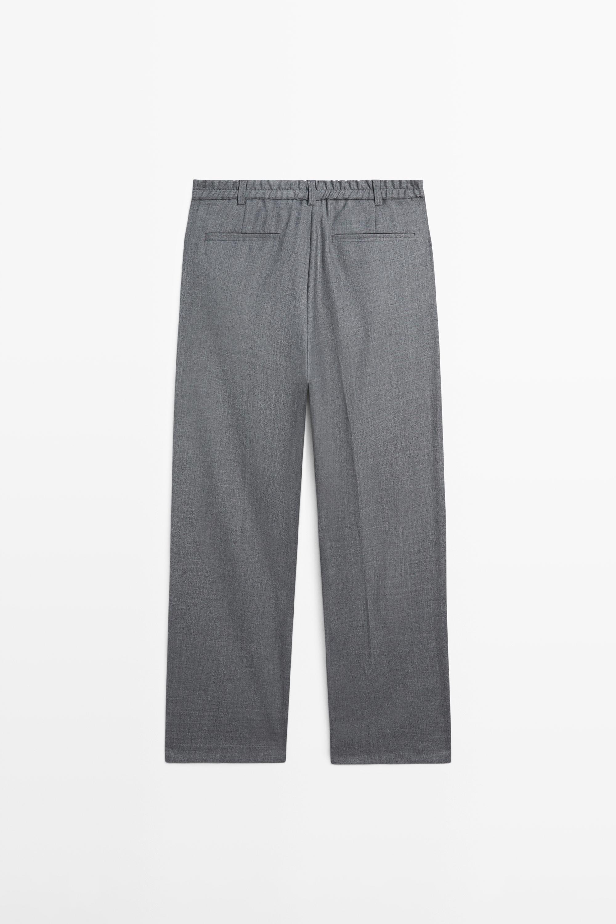 Pantalon relaxed fit à pinces en laine froide
