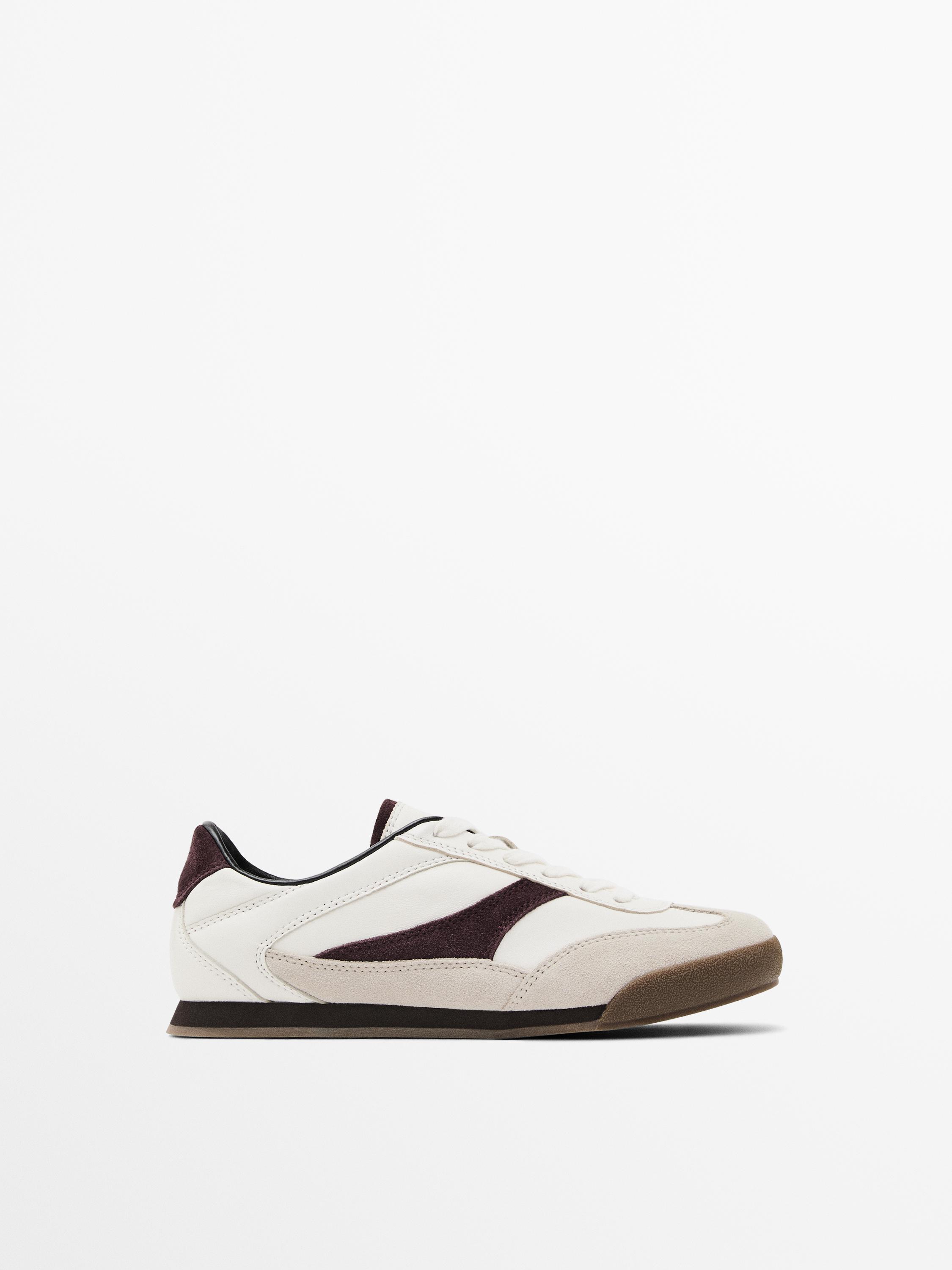 Tennis cuir contrastant