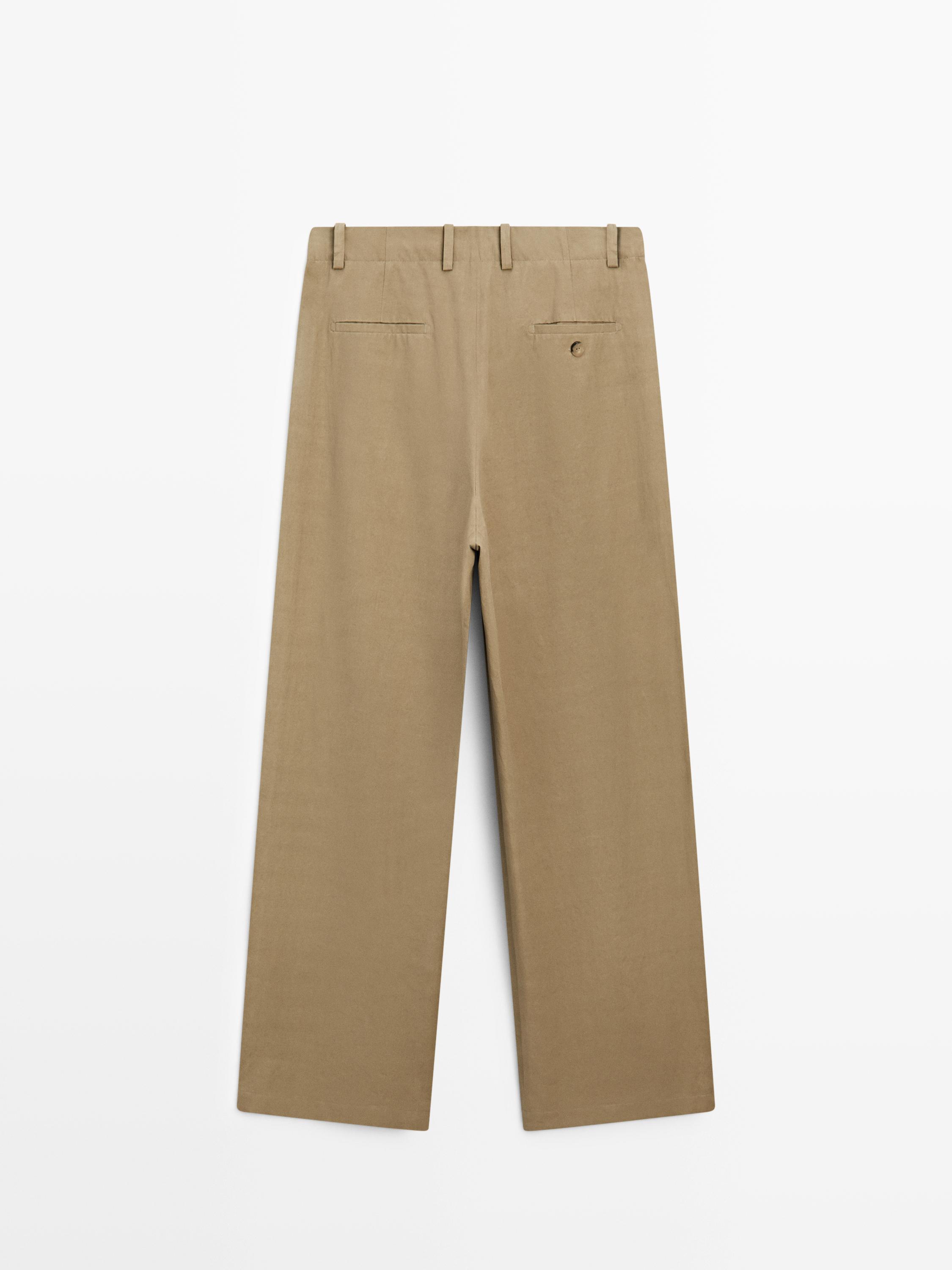 Pantalon à plis avec fermeture croisée - STUDIO