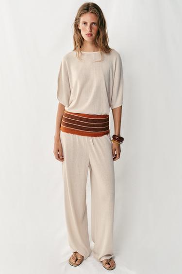 توب ريفي بأكمام كاب - بيج فاتح الخاص بـ Zara