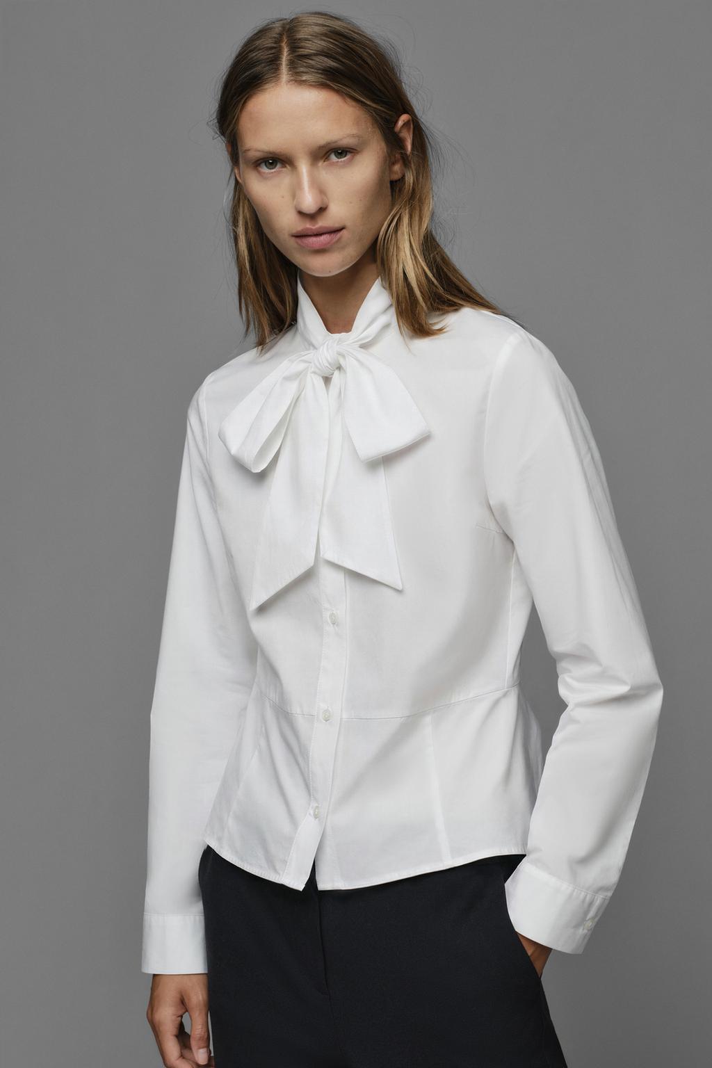 PEPLUM SHIRT WITH TIED DETAIL
