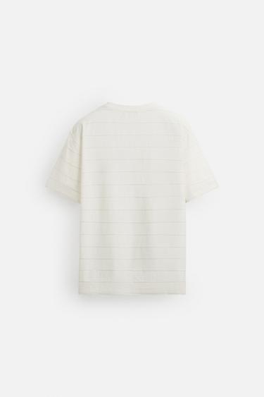 CAMISETA ESTRUCTURA IRREGULAR RAYAS - Blanco roto de Zara