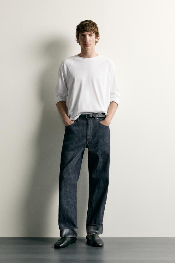 STRAIGHT-LEG JEANS WITH CONTRAST TURN-UPS - Indigo de Zara - Imagen 0
