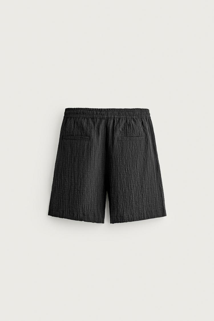 BERMUDA RELAXED FIT CON TEXTURA 6