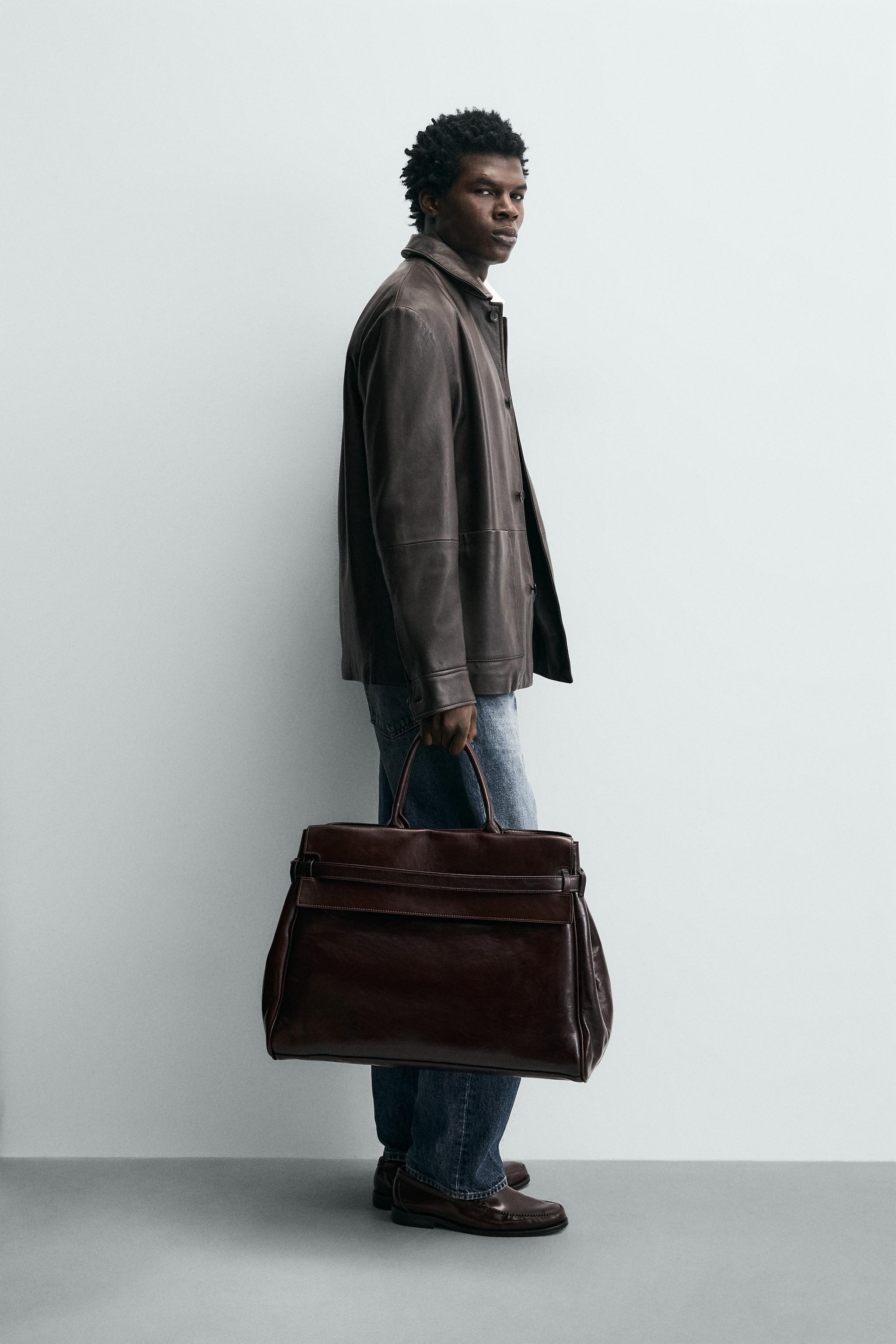 BLOUSON EN CUIR À POCHES