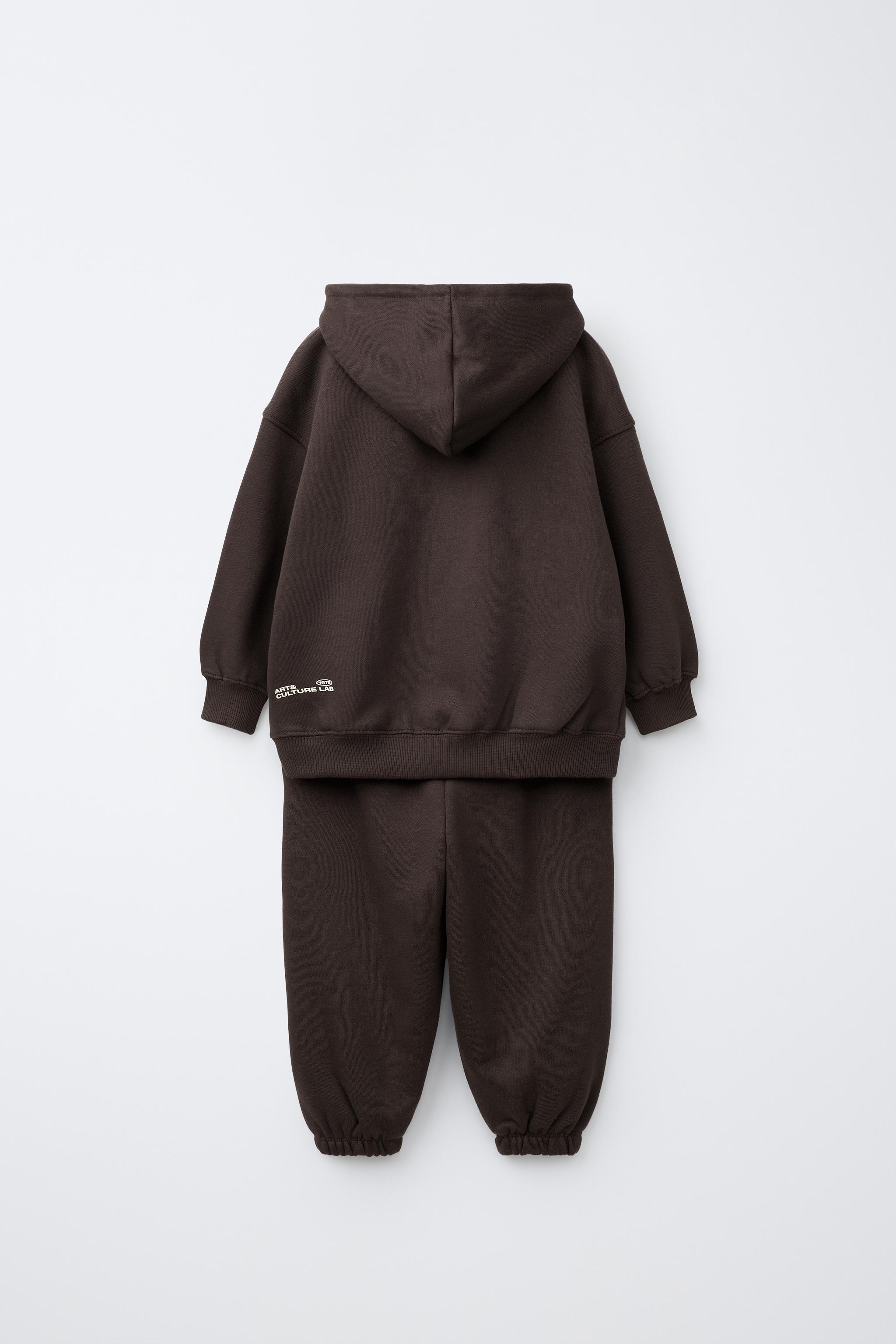 ENSEMBLE DE JOGGING AVEC SWEAT À CAPUCHE ET PANTALON JOG INSCRIPTION