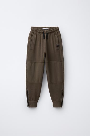 CALÇAS SLIM COM FECHOS DE CORRER - torrado da Zara