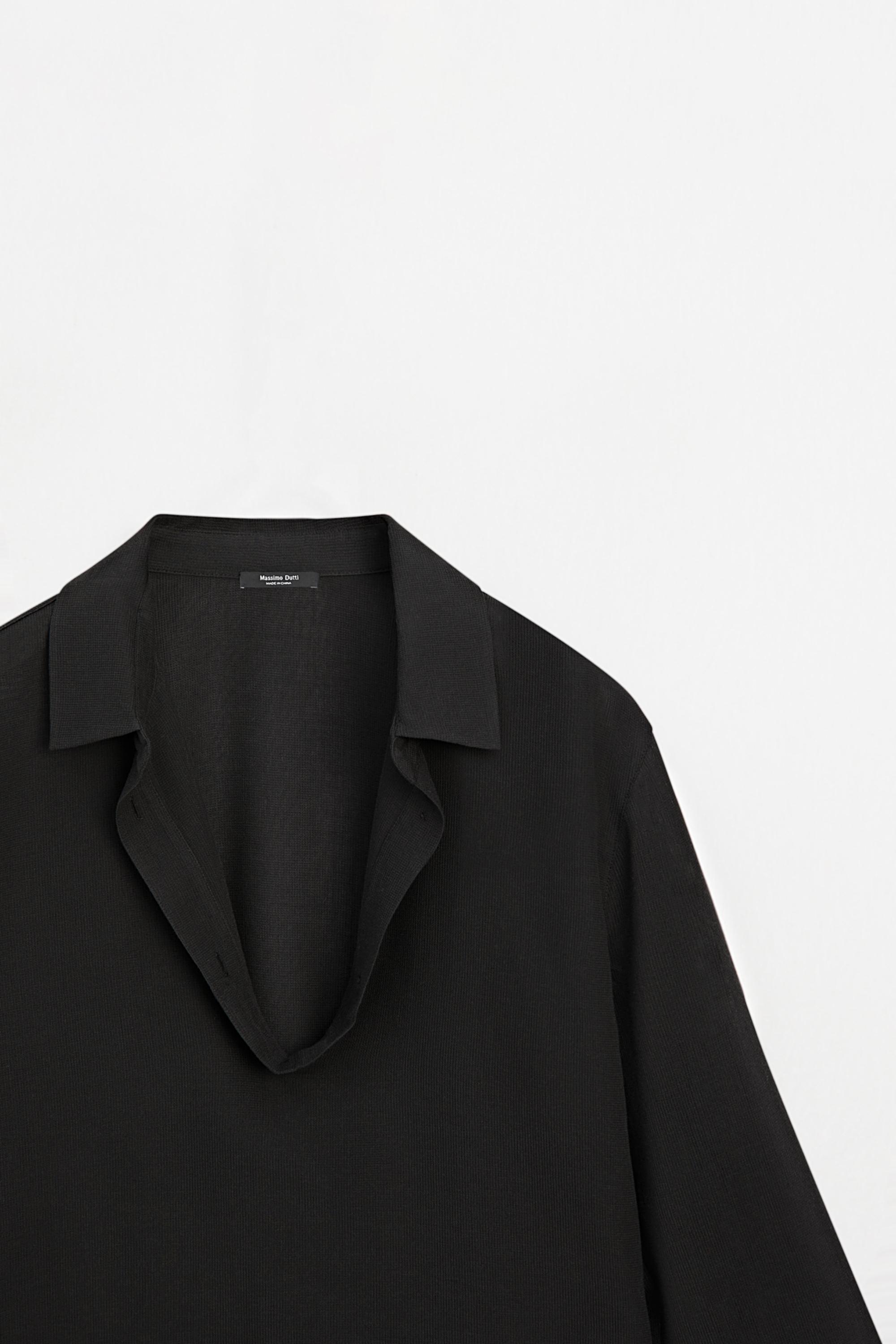 Flowing cotton blend V-neck shirt