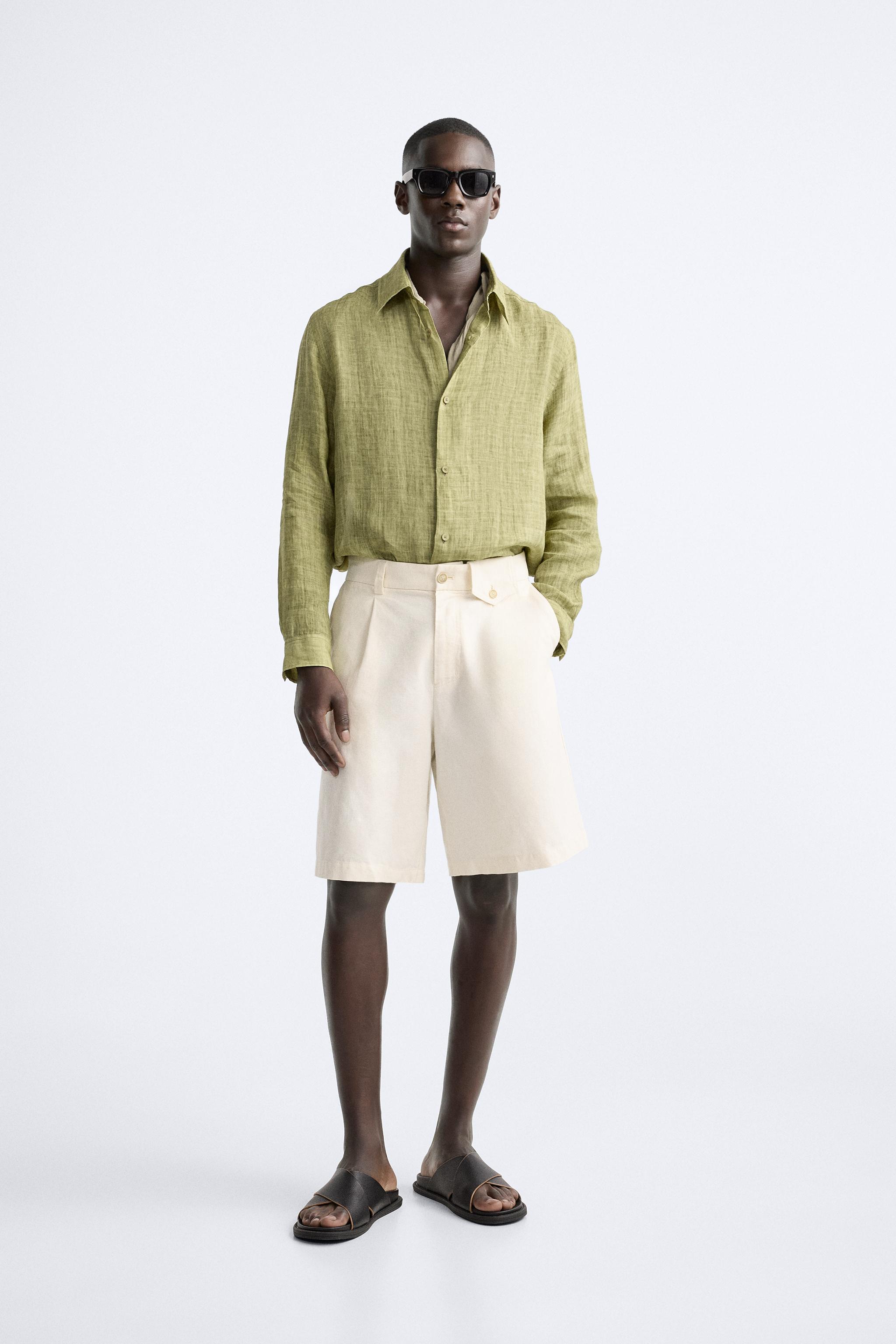 PLEATED BERMUDA SHORTS