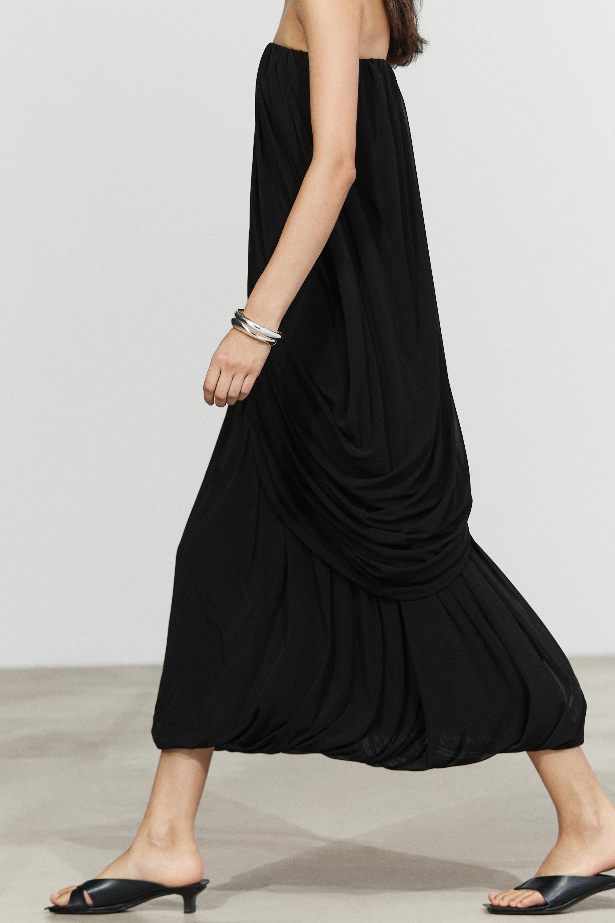 Strapless flowing top