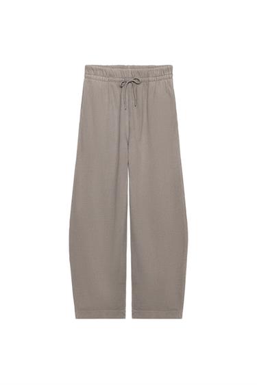 WASHED-EFFECT TROUSERS - Sand by Zara