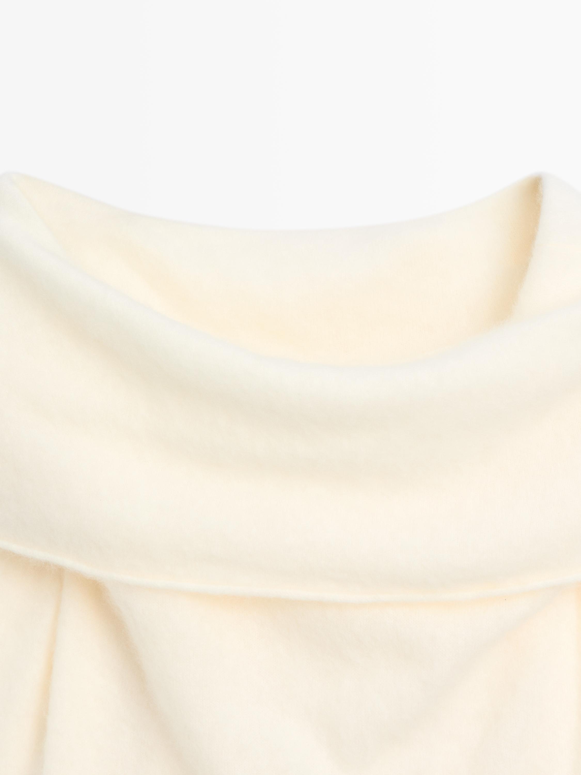 Pull en maille épaules dénudées laine et cachemire