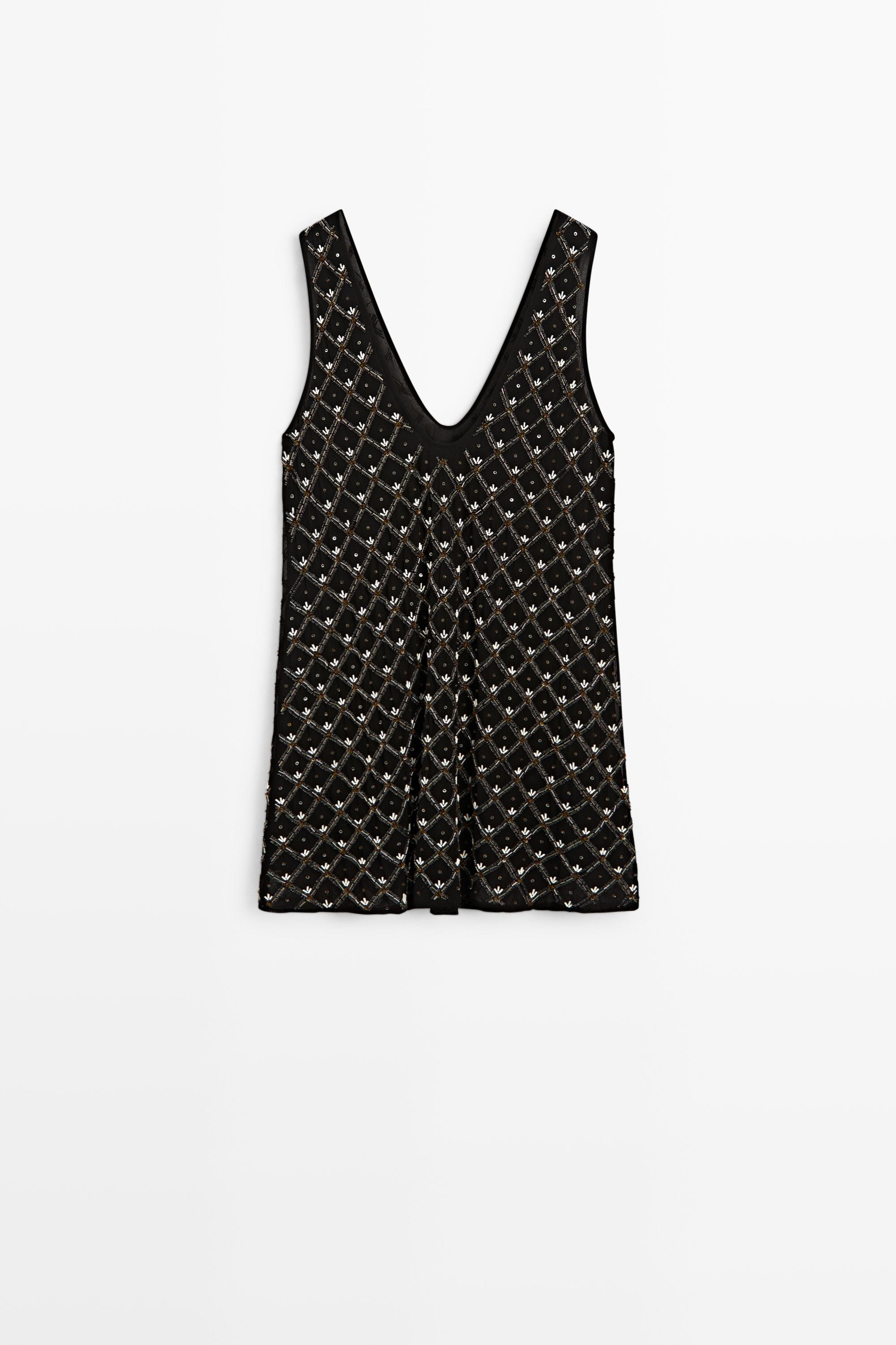 Mini dress with beaded detail