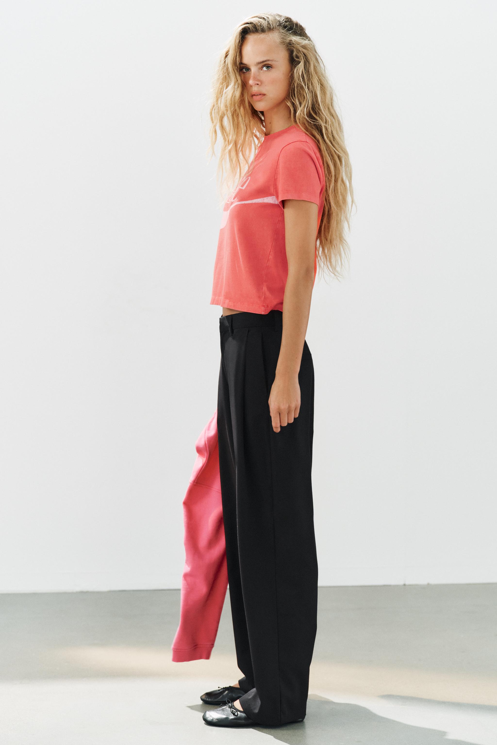 STRIPED PLEATED PANTS