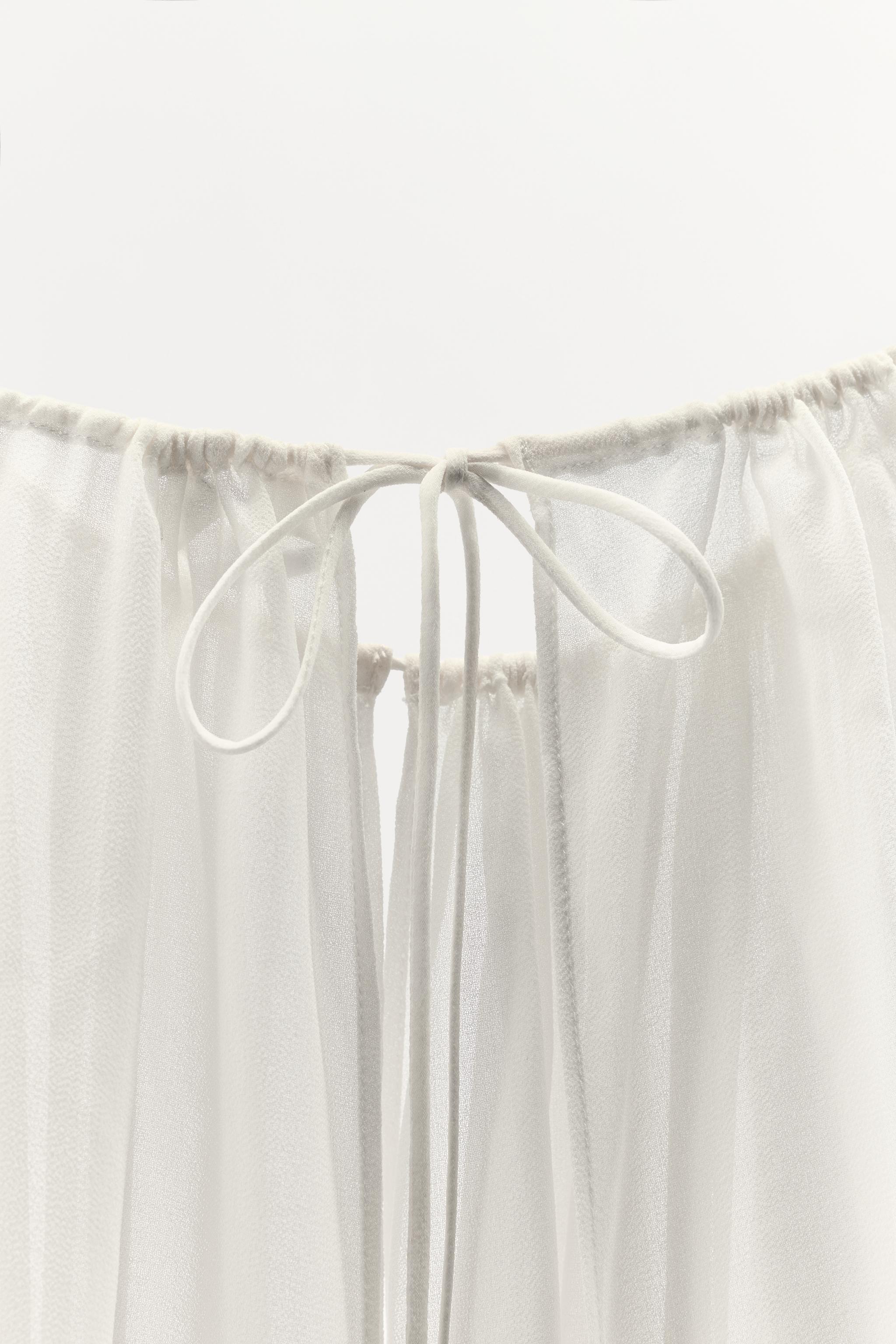 ASYMMETRIC LONG CAPE