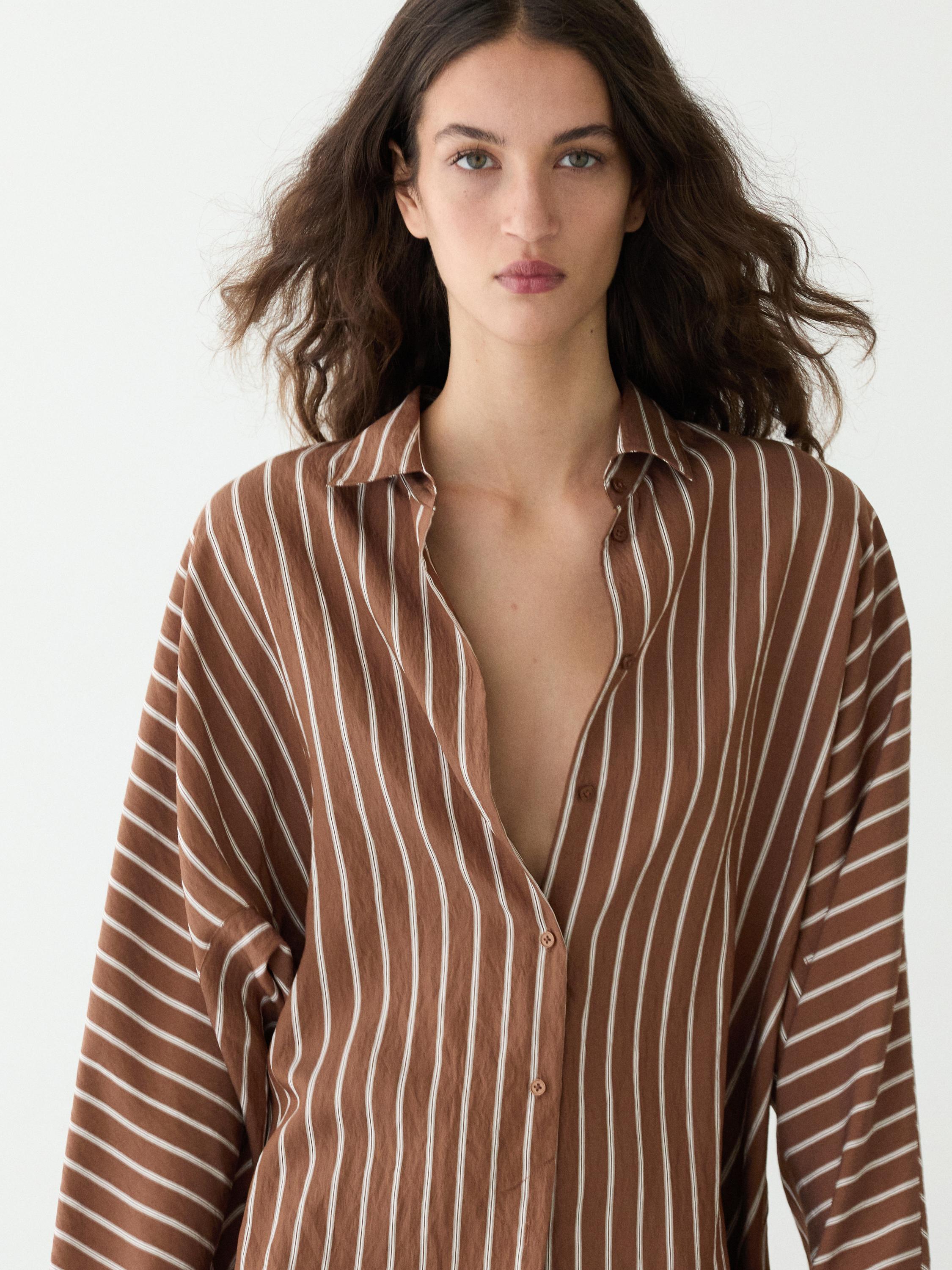 Flowing striped shirt with batwing sleeves