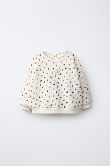 Buzo con estampado floral