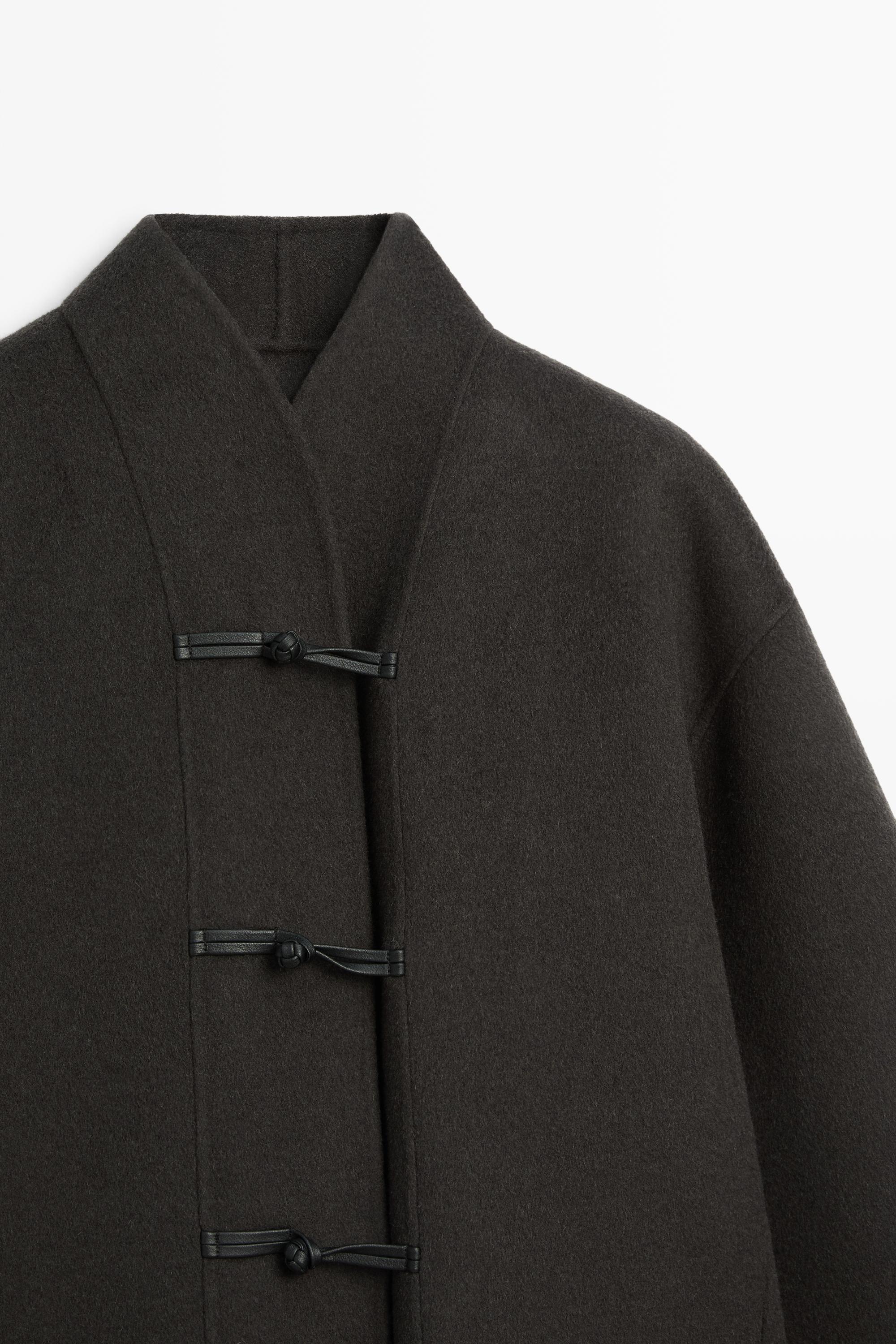Short wool-blend coat with button detail