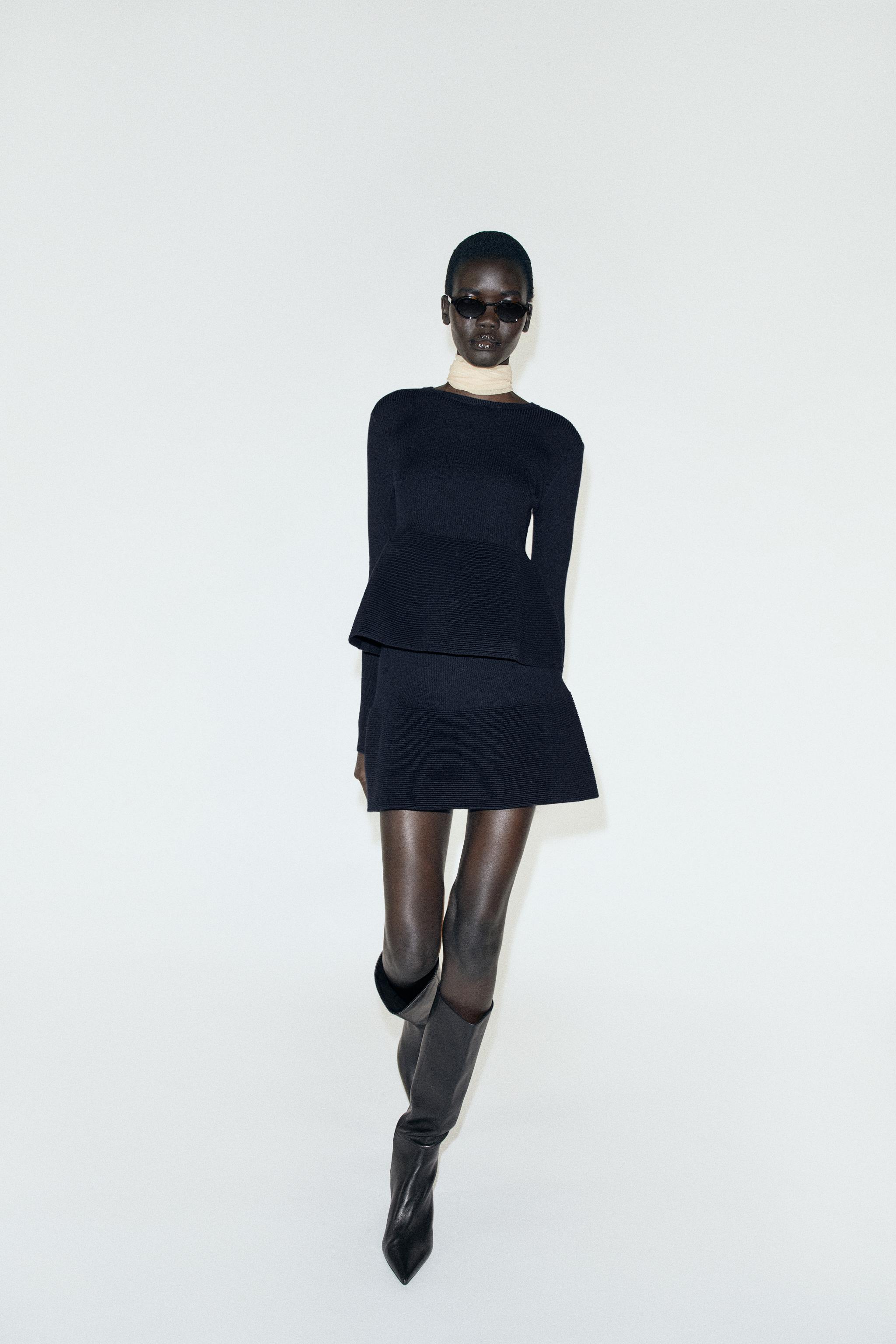 PEPLUM KNIT MINI SKIRT