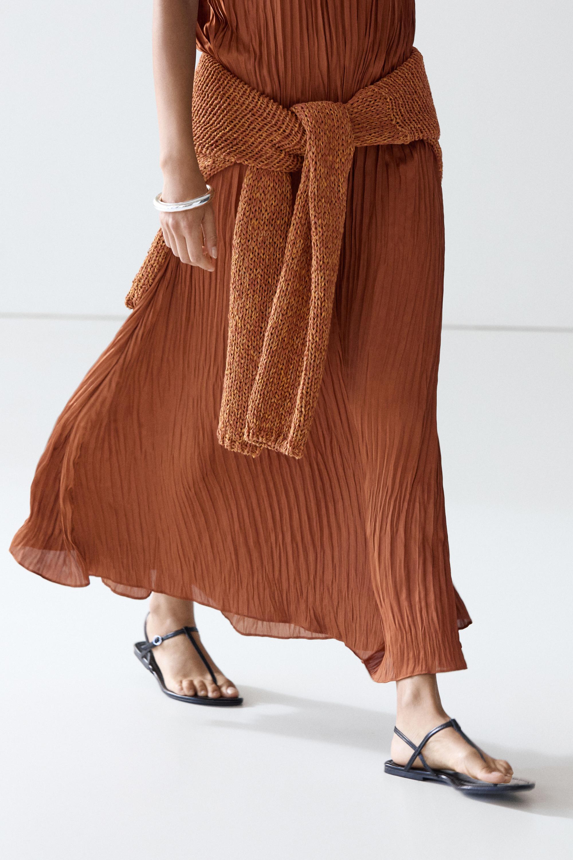 Long pleated halterneck dress