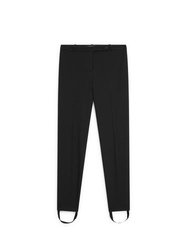 Pantalon avec élastique dans le bas - Noir de Zara