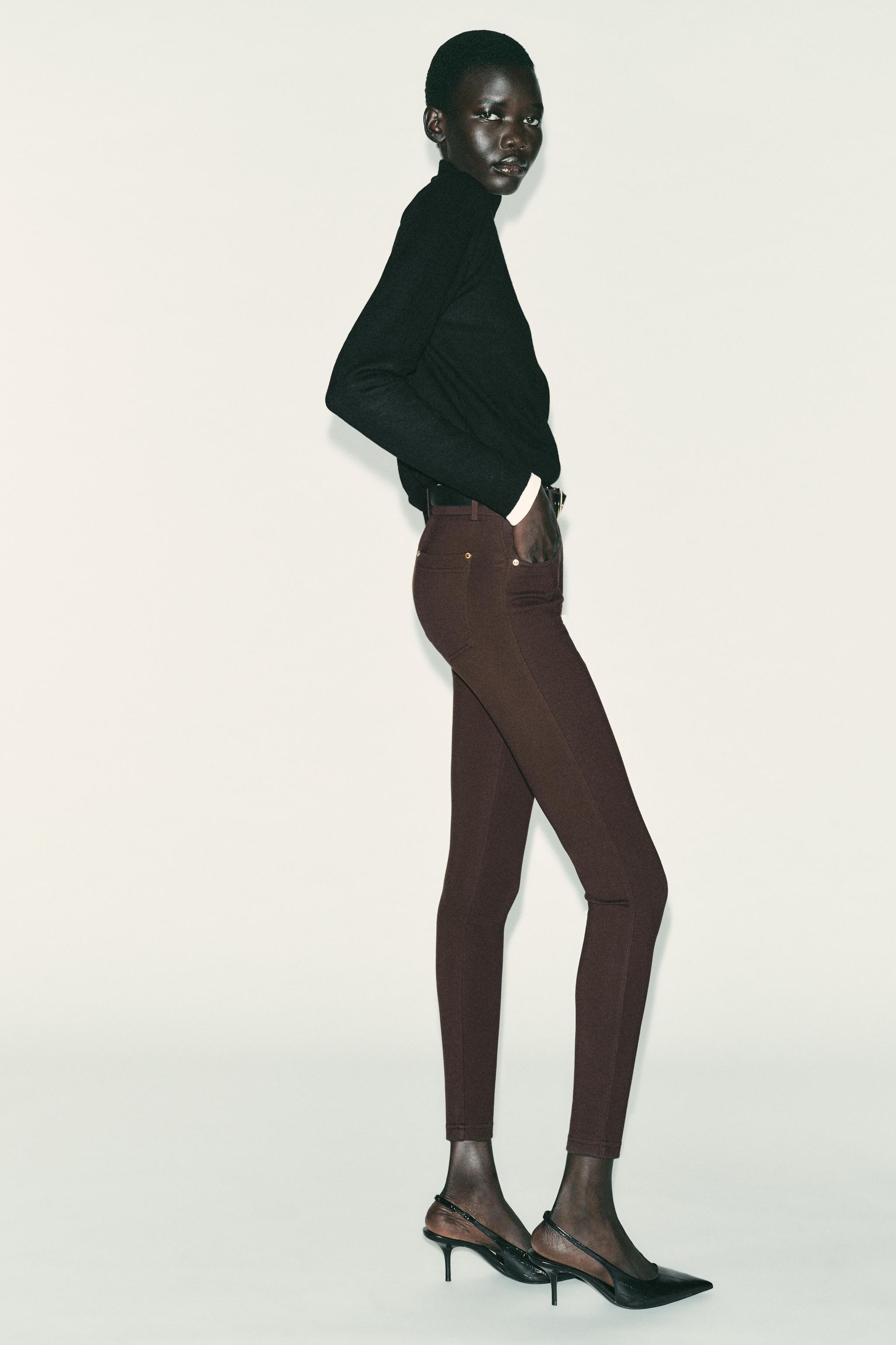 MID-RISE BELTED JEGGINGS