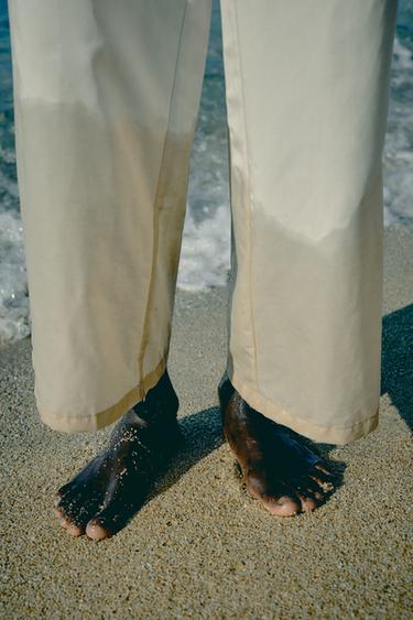 بنطلون RELAXED FIT - بيج الخاص بـ Zara