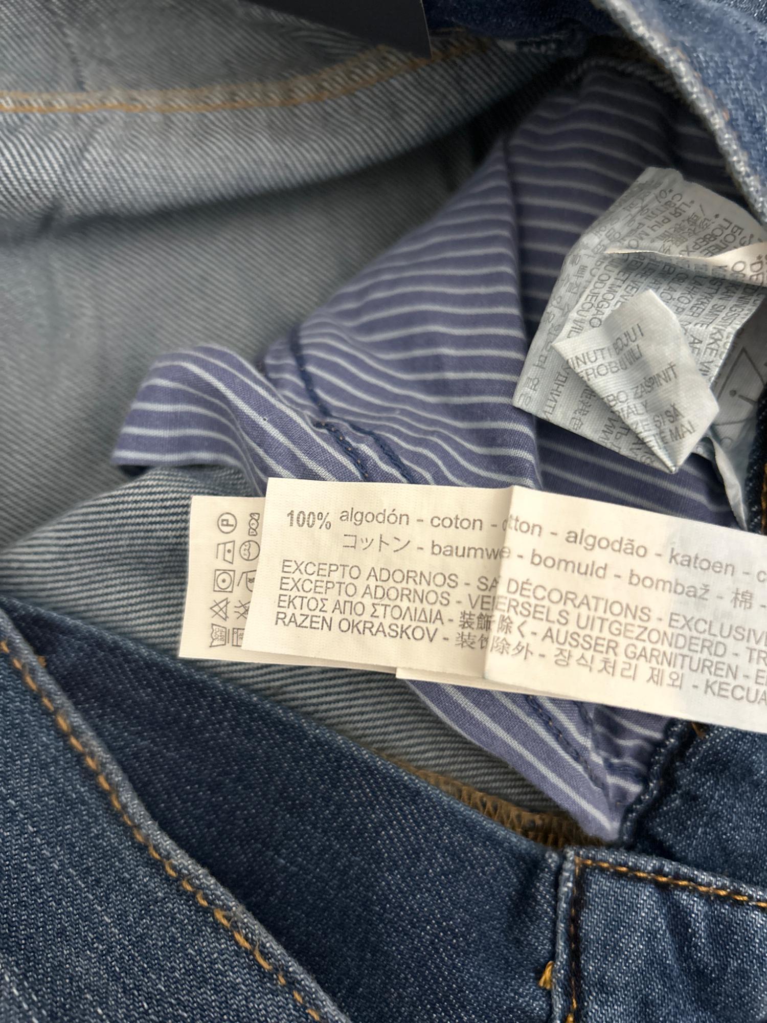 BLUE RIPPED SLOUCHY JEANS