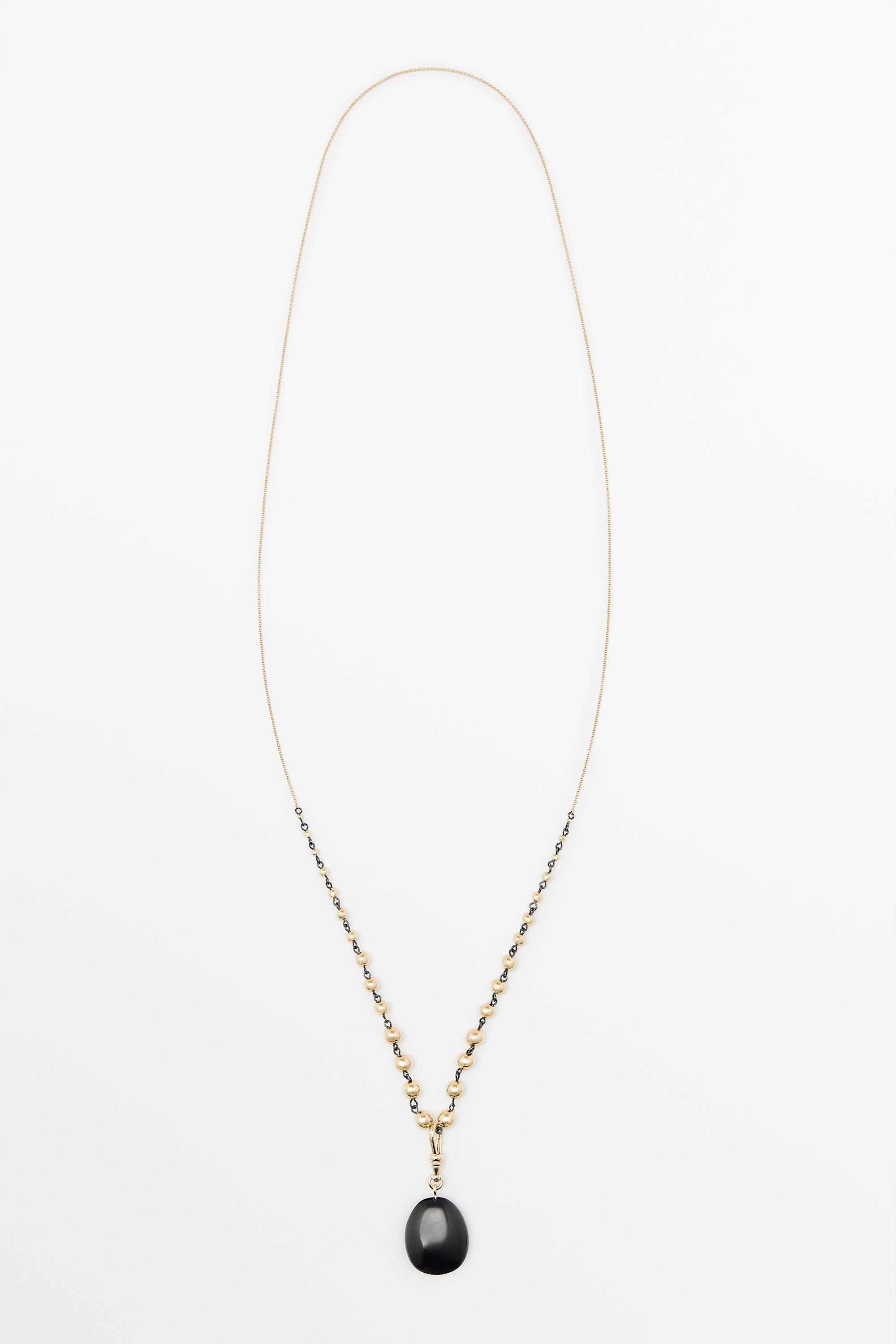 Collier chaîne à billes et onyx
