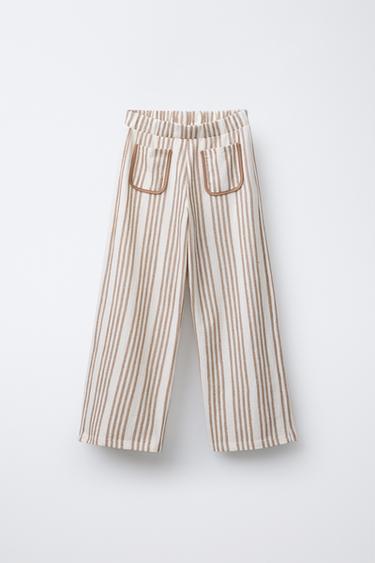 PANTALÓN RAIAS PETOS VIVO - Beixe de Zara