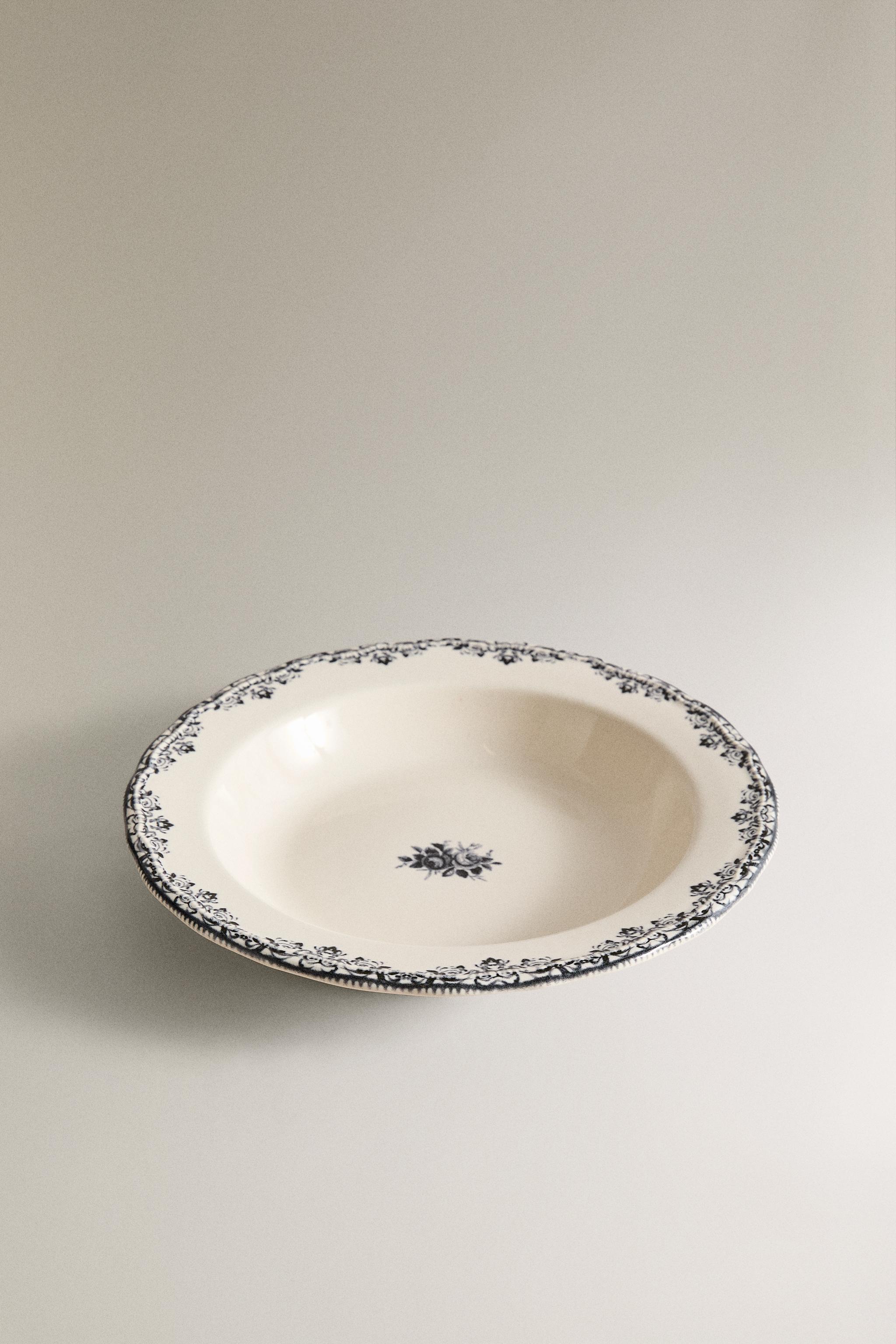 EARTHENWARE SOUP PLATE WITH PLACED DESIGN