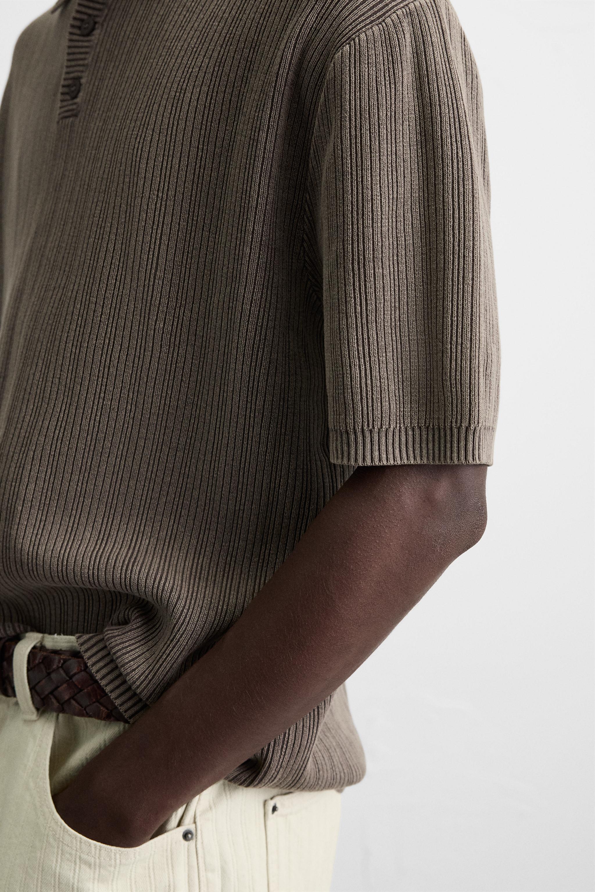 POLO EN MAILLE STRUCTURÉE DÉLAVÉE